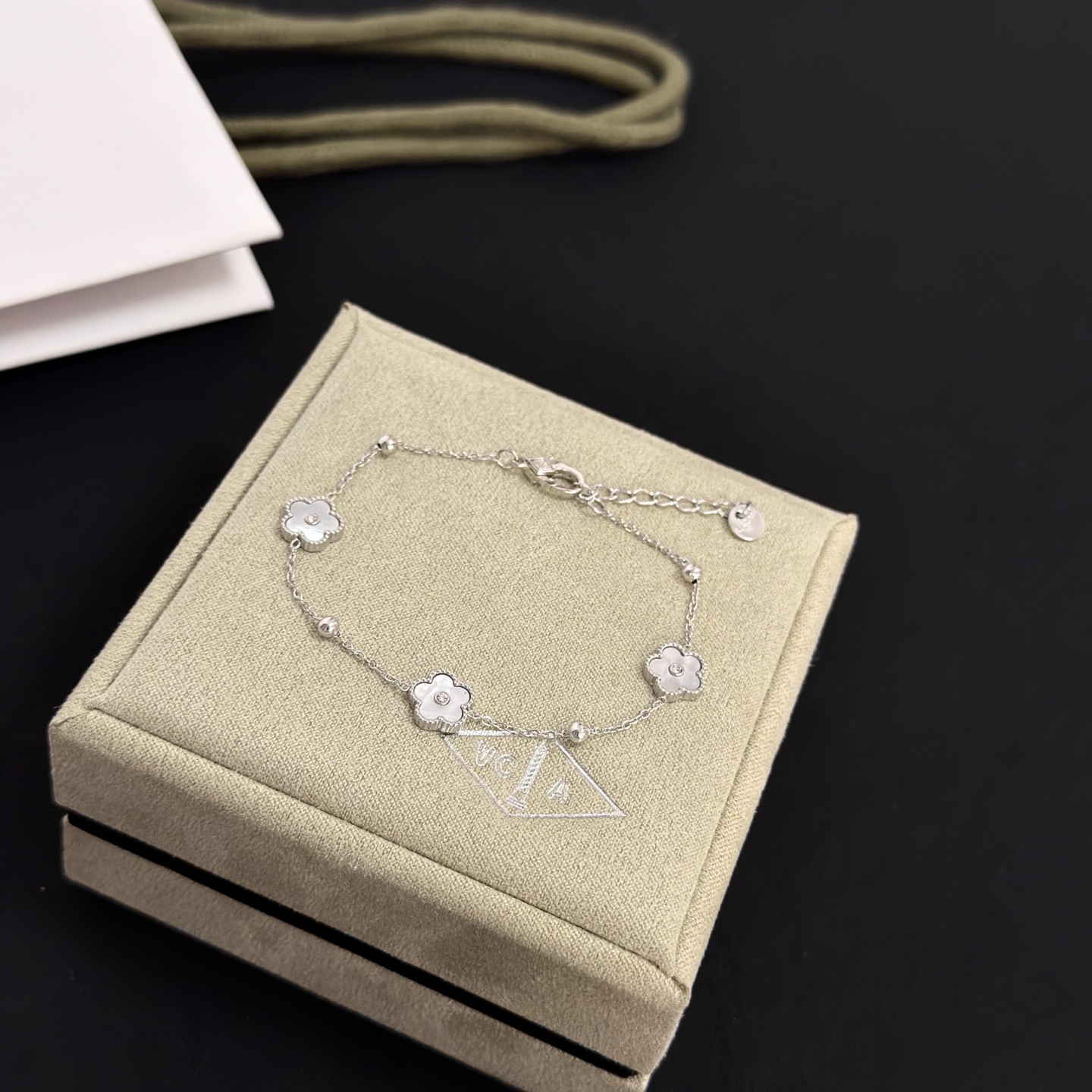 Van Cleef Arpels Alhambra bracelet silver-toned metal white mother-of-pearl clear diamond accents 17cm