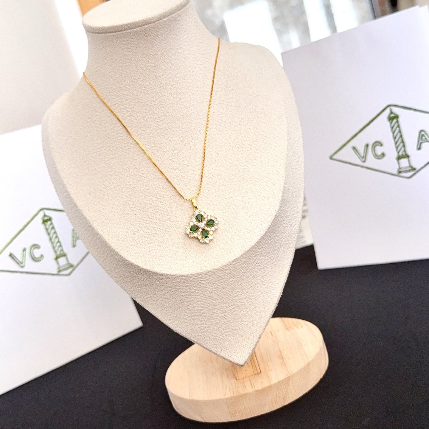 Van Cleef Arpels Alhambra necklace yellow gold metal with green gemstones and clear diamond accents 42cm