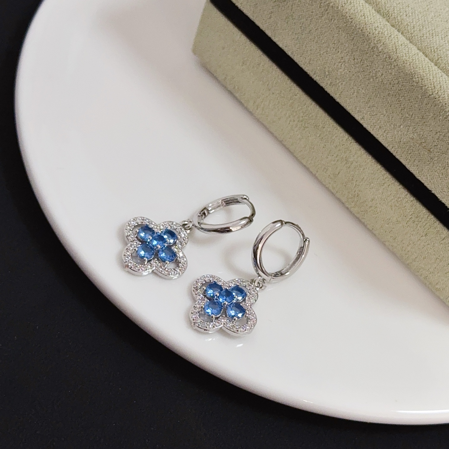 Van Cleef Arpels Alhambra earrings silver-toned white metal blue gemstones clear diamond accents 12mm hoop diameter 10mm clover charm