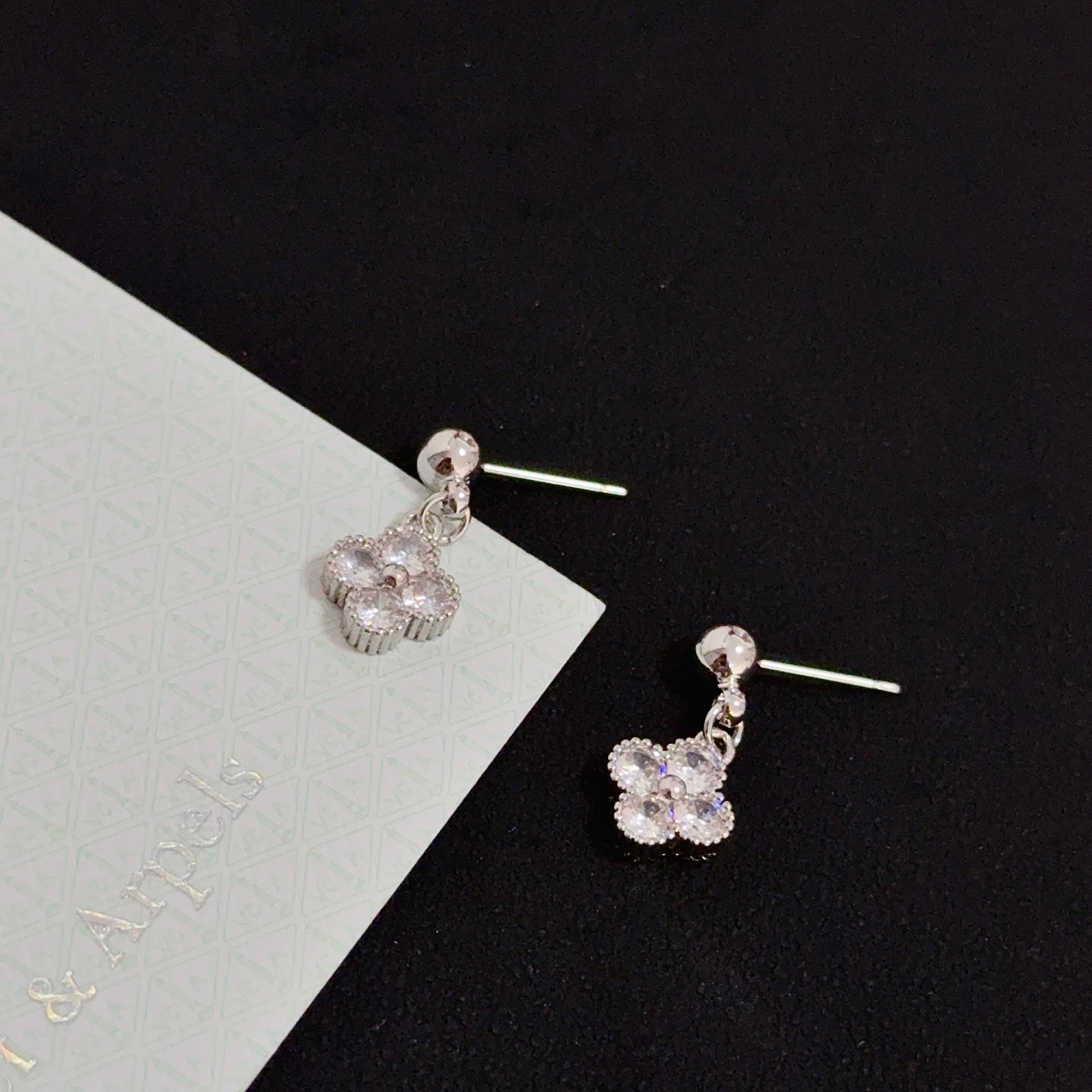 Van Cleef Arpels Alhambra earrings silver-toned white gold metal with clear diamond accents 10mm pendant drop
