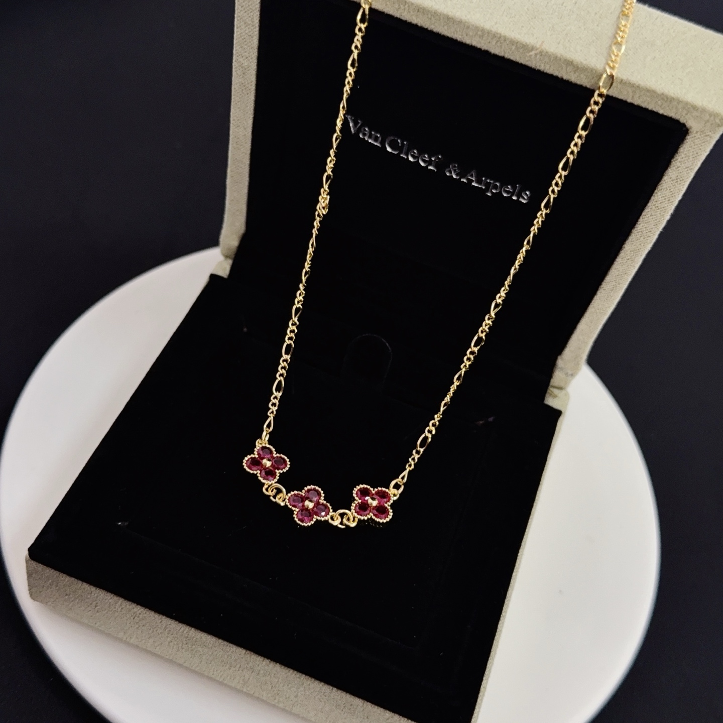 Van Cleef Arpels Alhambra necklace yellow gold with deep red clover motifs 42cm