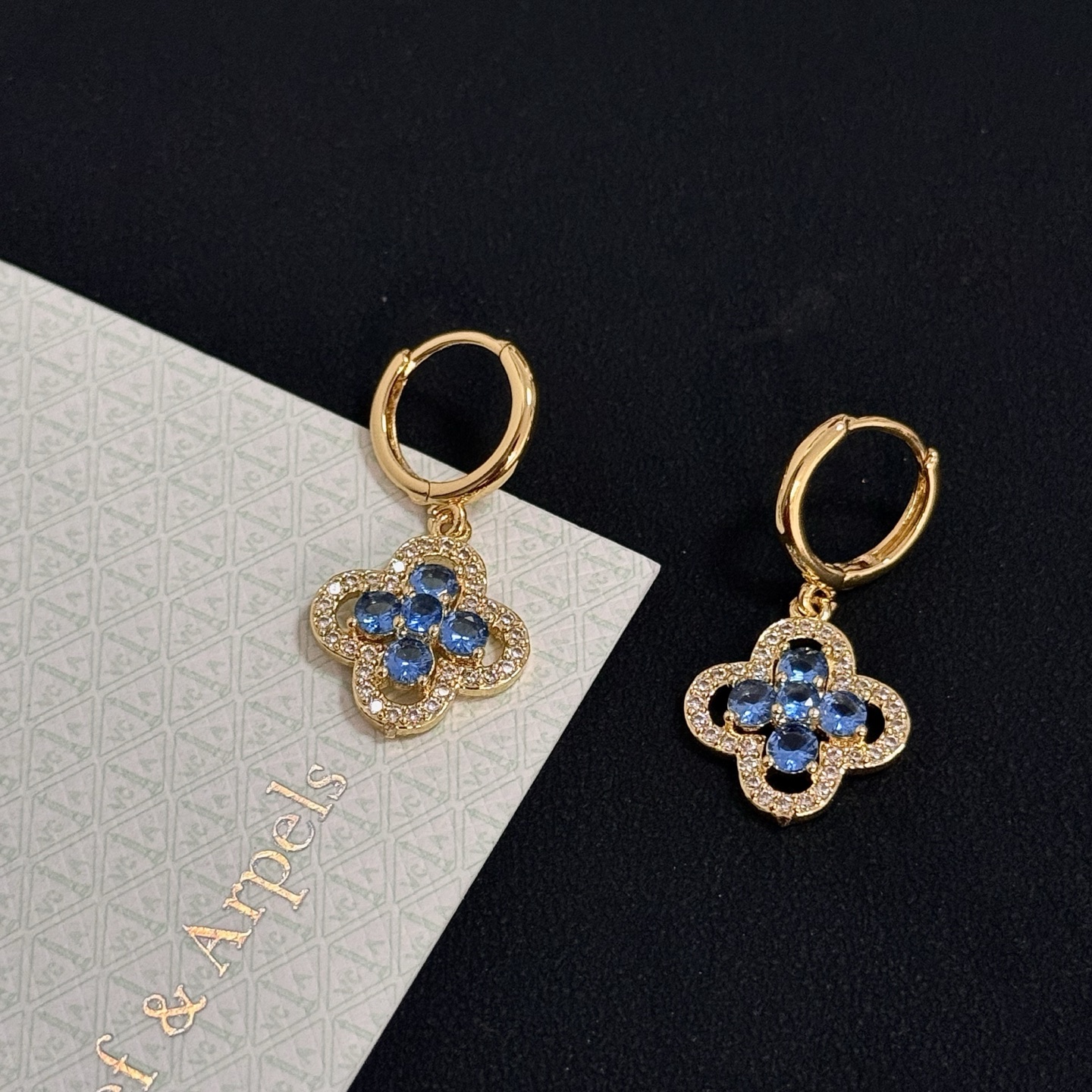 Van Cleef Arpels Alhambra earrings yellow gold metal blue gemstones white diamond accents 12mm hoop diameter 10mm pendant drop