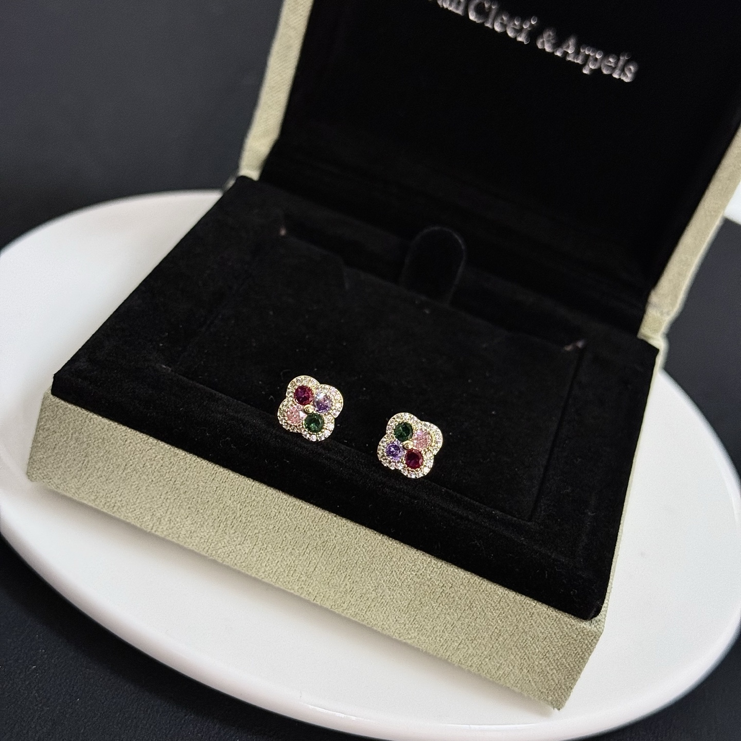 Van Cleef Arpels Alhambra earrings yellow gold metal with white diamond pave green pink purple and ruby red gemstones 8mm stud diameter