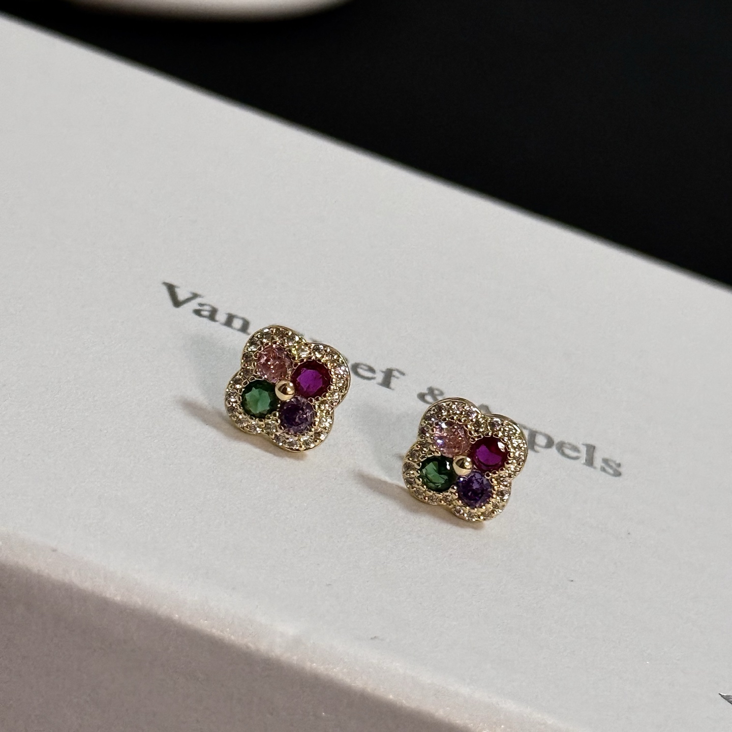 Van Cleef Arpels Alhambra earrings yellow gold metal with white diamond pave green pink purple and ruby red gemstones 8mm stud diameter