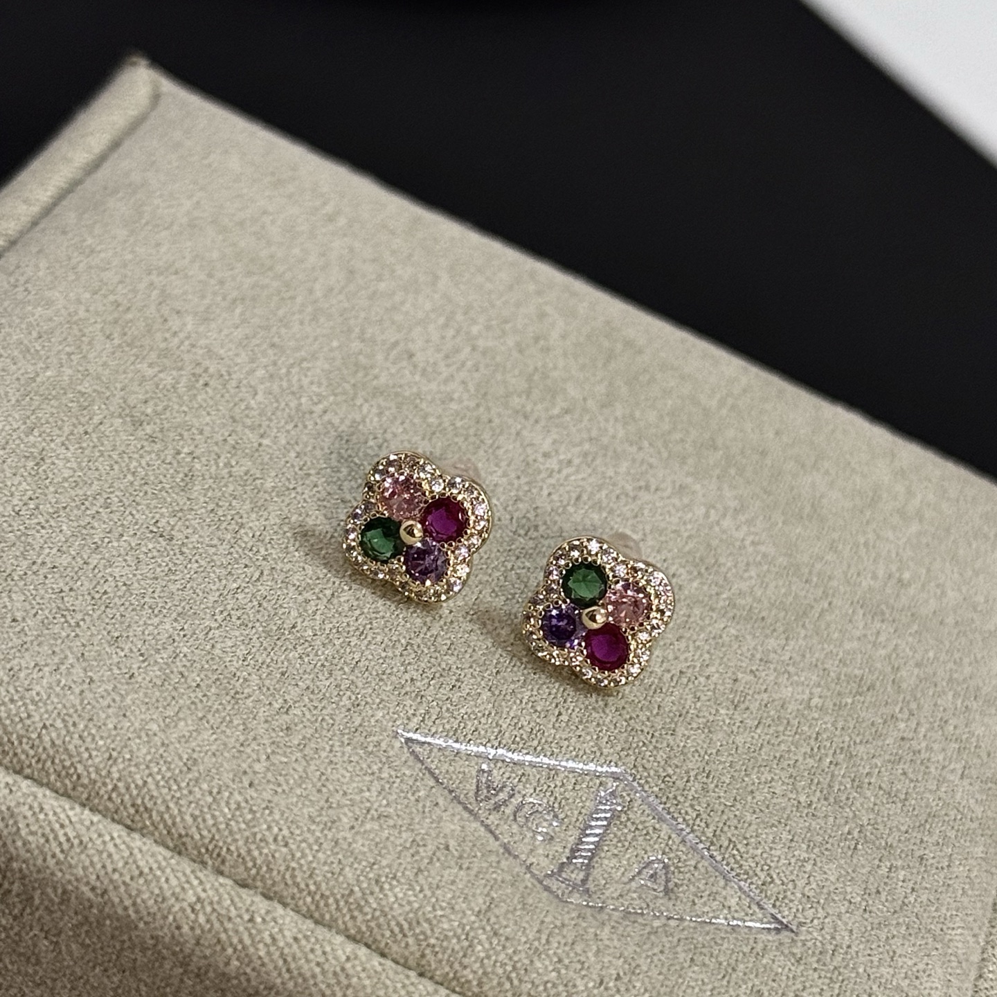 Van Cleef Arpels Alhambra earrings yellow gold metal with white diamond pave green pink purple and ruby red gemstones 8mm stud diameter