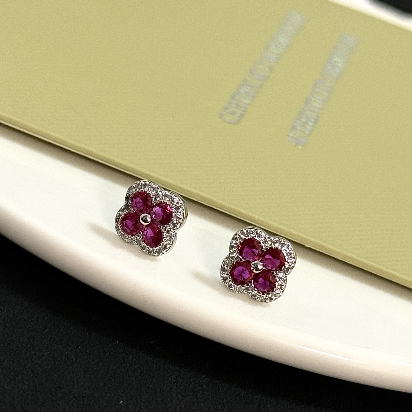 Van Cleef Arpels Alhambra earrings white gold metal ruby red gemstones white diamond accents 8mm stud diameter