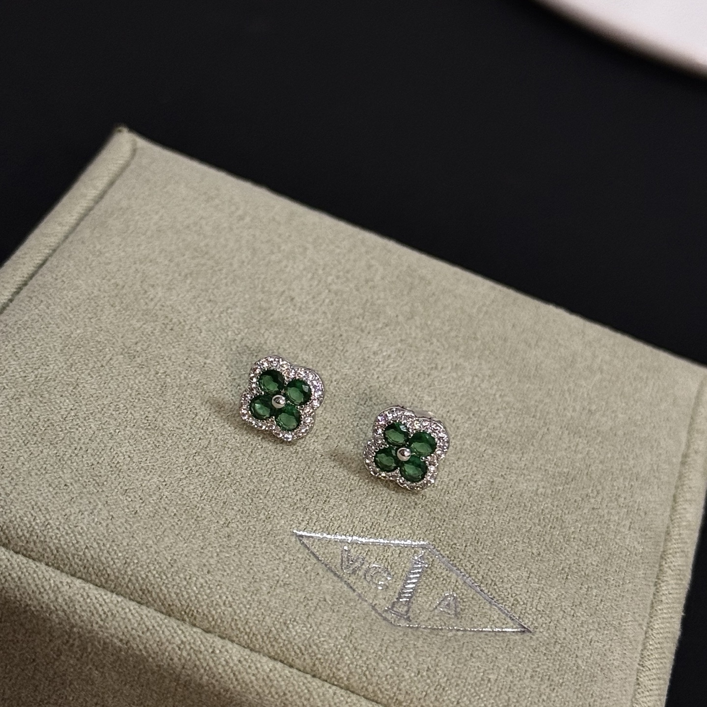 Van Cleef Arpels Alhambra earrings white gold metal with green gemstones and white diamond accents 8mm stud diameter