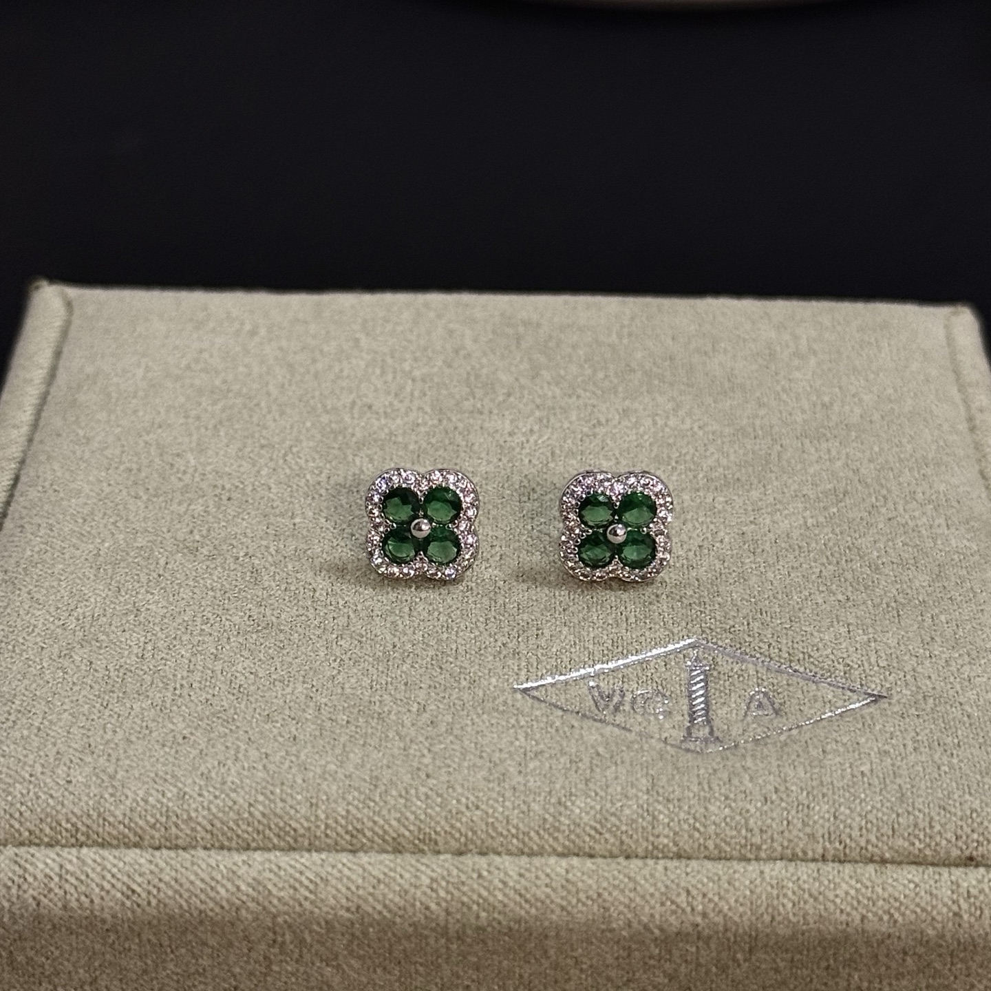 Van Cleef Arpels Alhambra earrings white gold metal with green gemstones and white diamond accents 8mm stud diameter
