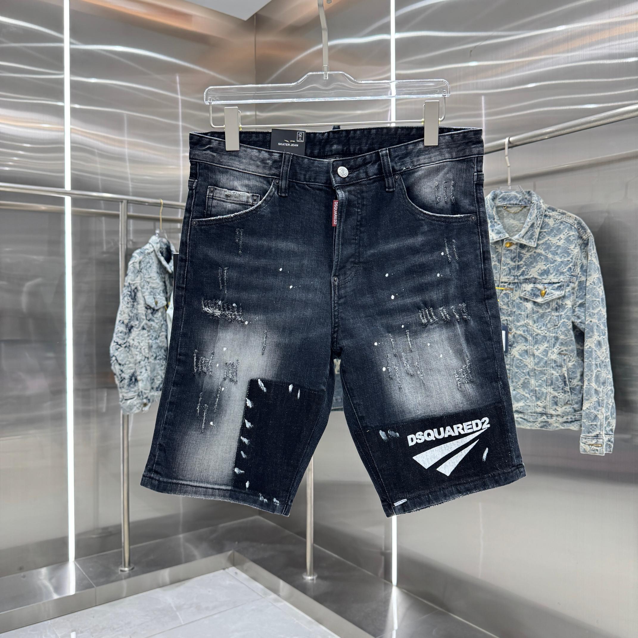 P140 DSQUARED2 shorts vaqueros elásticos ajustados de estilo urbano con letras, graffiti, rotos y lavado a la…