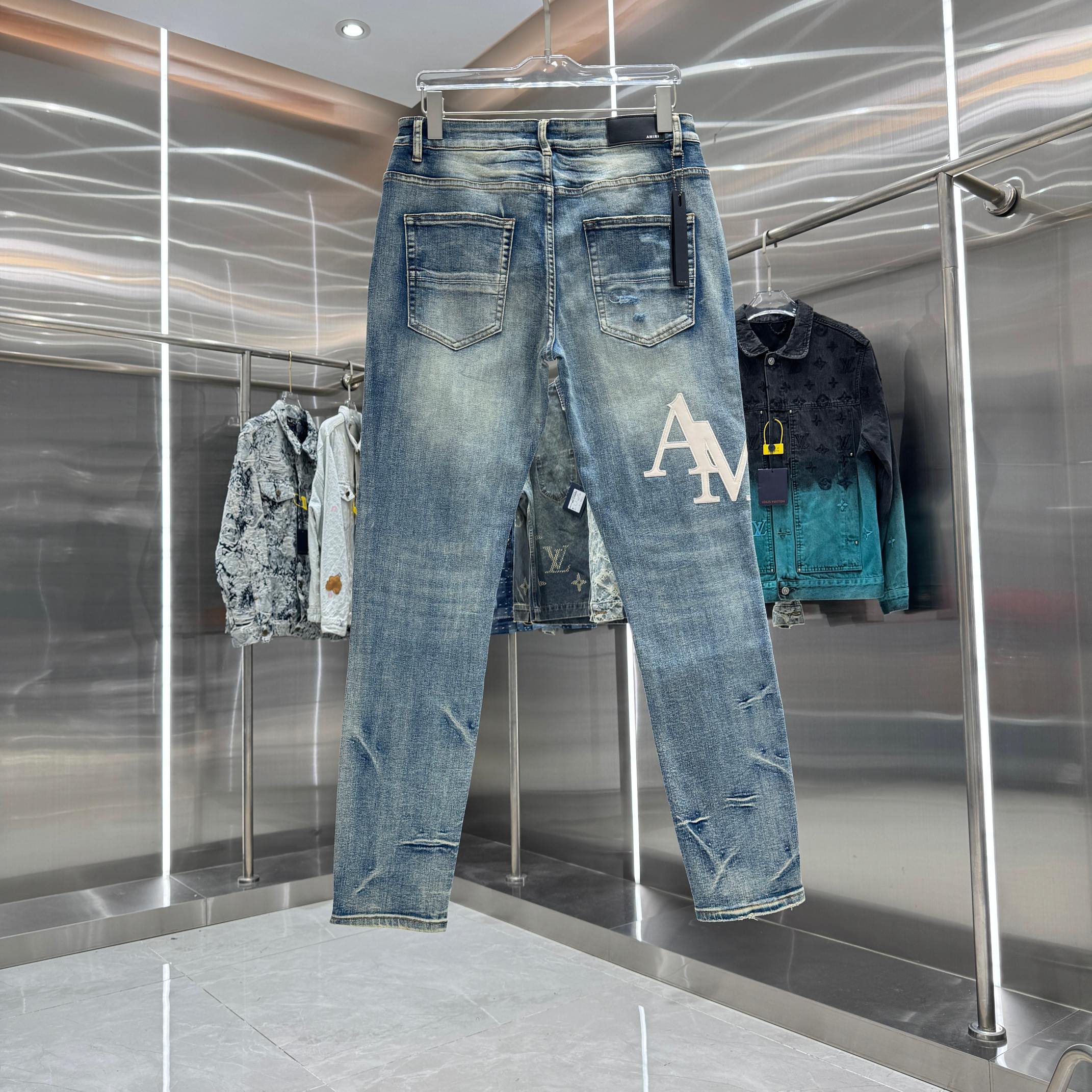 Amiri Amiri 破洞刺绣图案工艺街头潮流修身小脚弹力牛仔裤