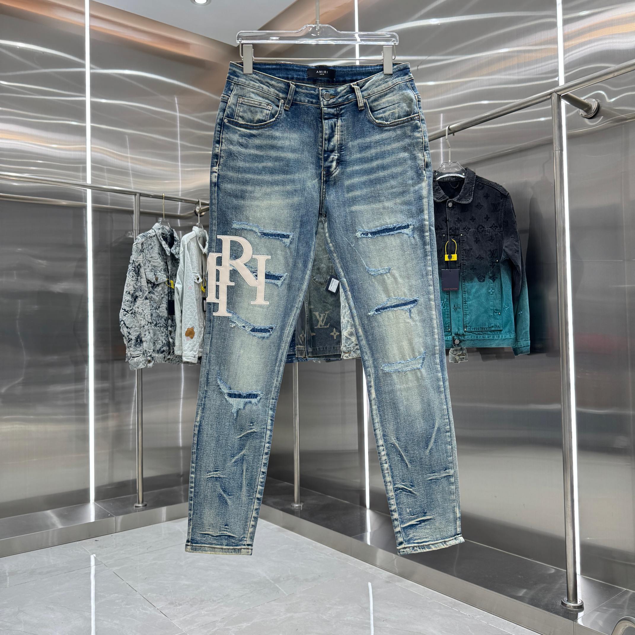 Amiri Amiri 破洞刺绣图案工艺街头潮流修身小脚弹力牛仔裤
