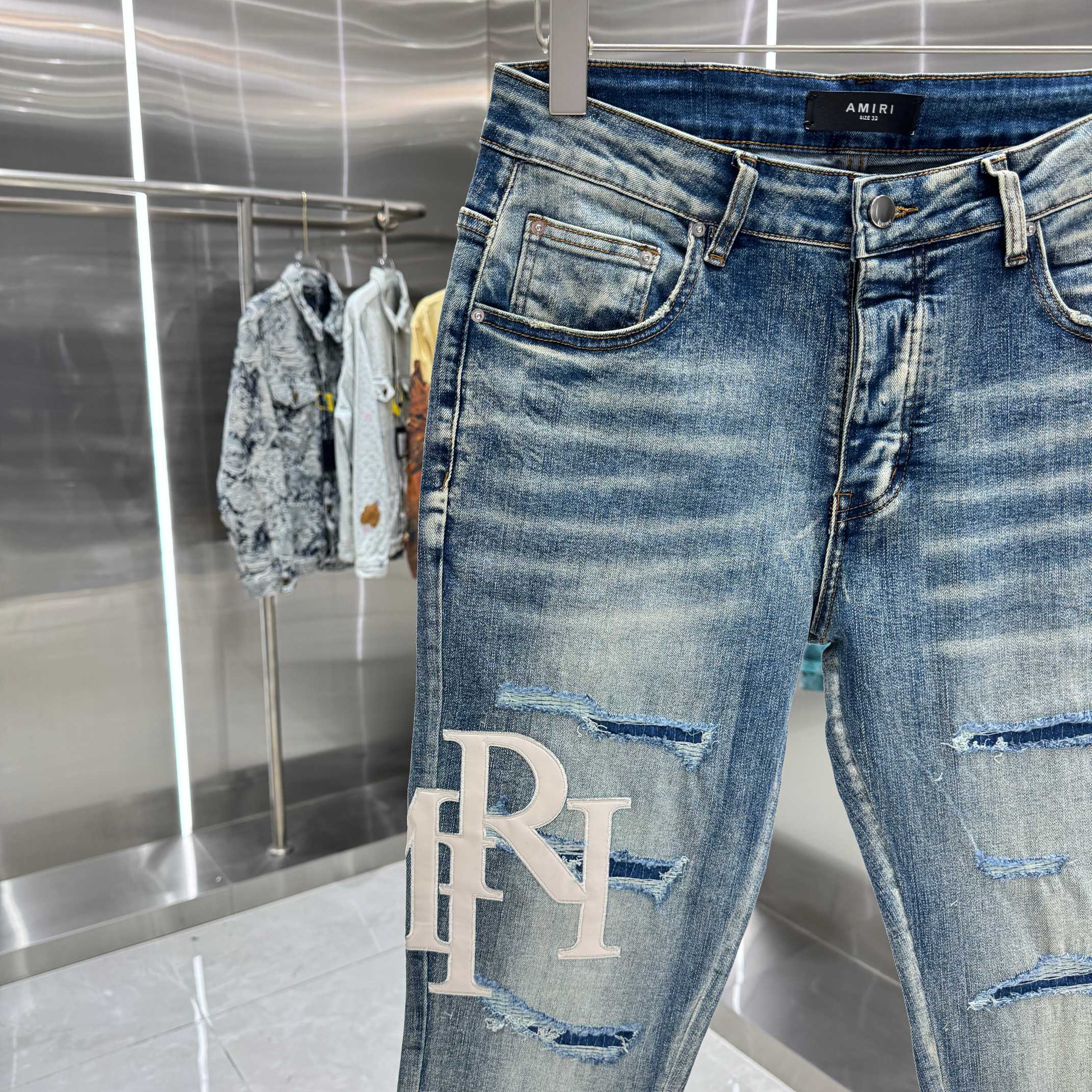 Amiri Amiri 破洞刺绣图案工艺街头潮流修身小脚弹力牛仔裤