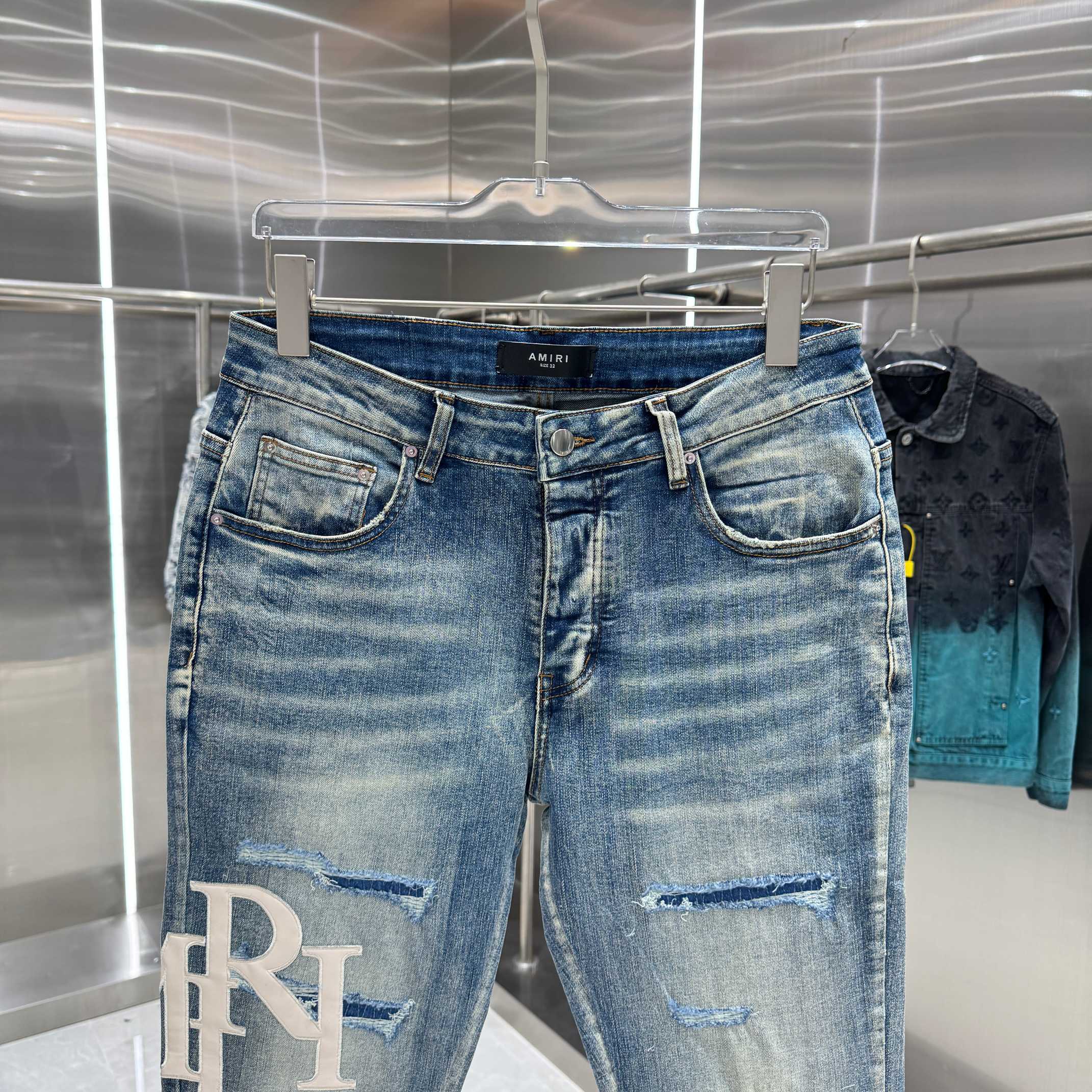 Amiri Amiri 破洞刺绣图案工艺街头潮流修身小脚弹力牛仔裤