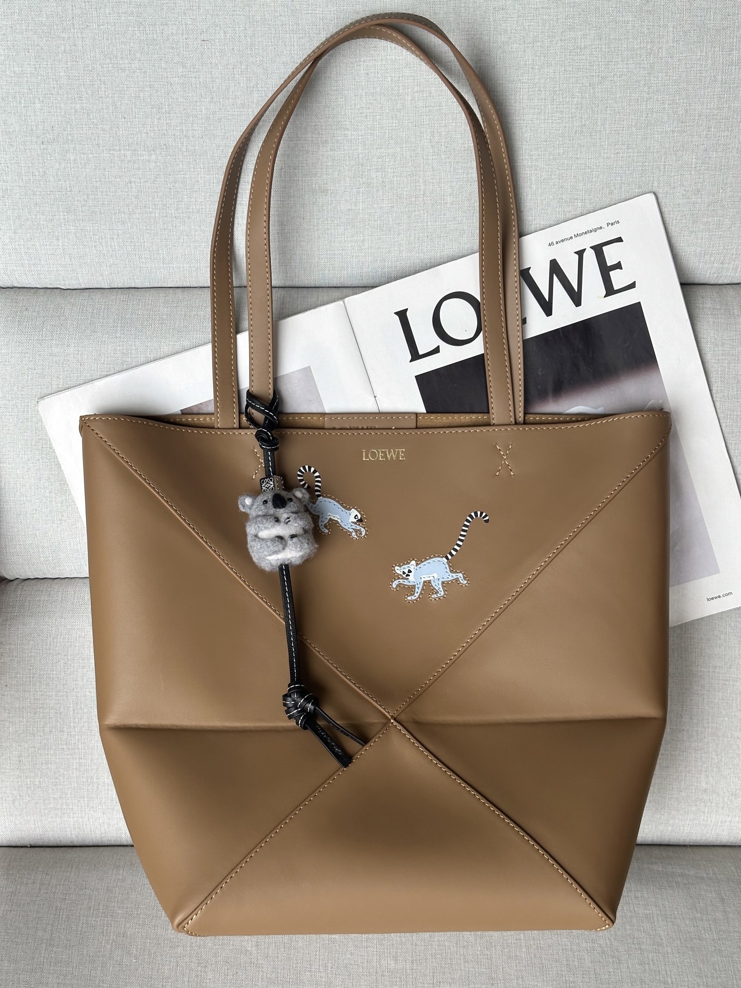 Loewe X SUNA FUJITA Puzzle Fold Tote Bag in Leather with Monkey Charm 1 i1749972419901 971 0 0