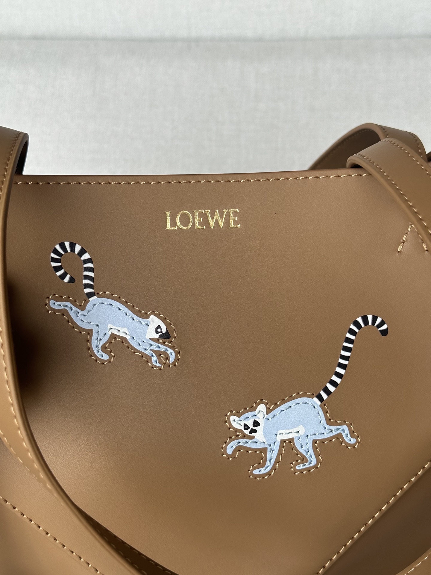 Loewe X SUNA FUJITA Puzzle Fold Tote Bag in Leather with Monkey Charm 9 i1749972421215 6303 0 1