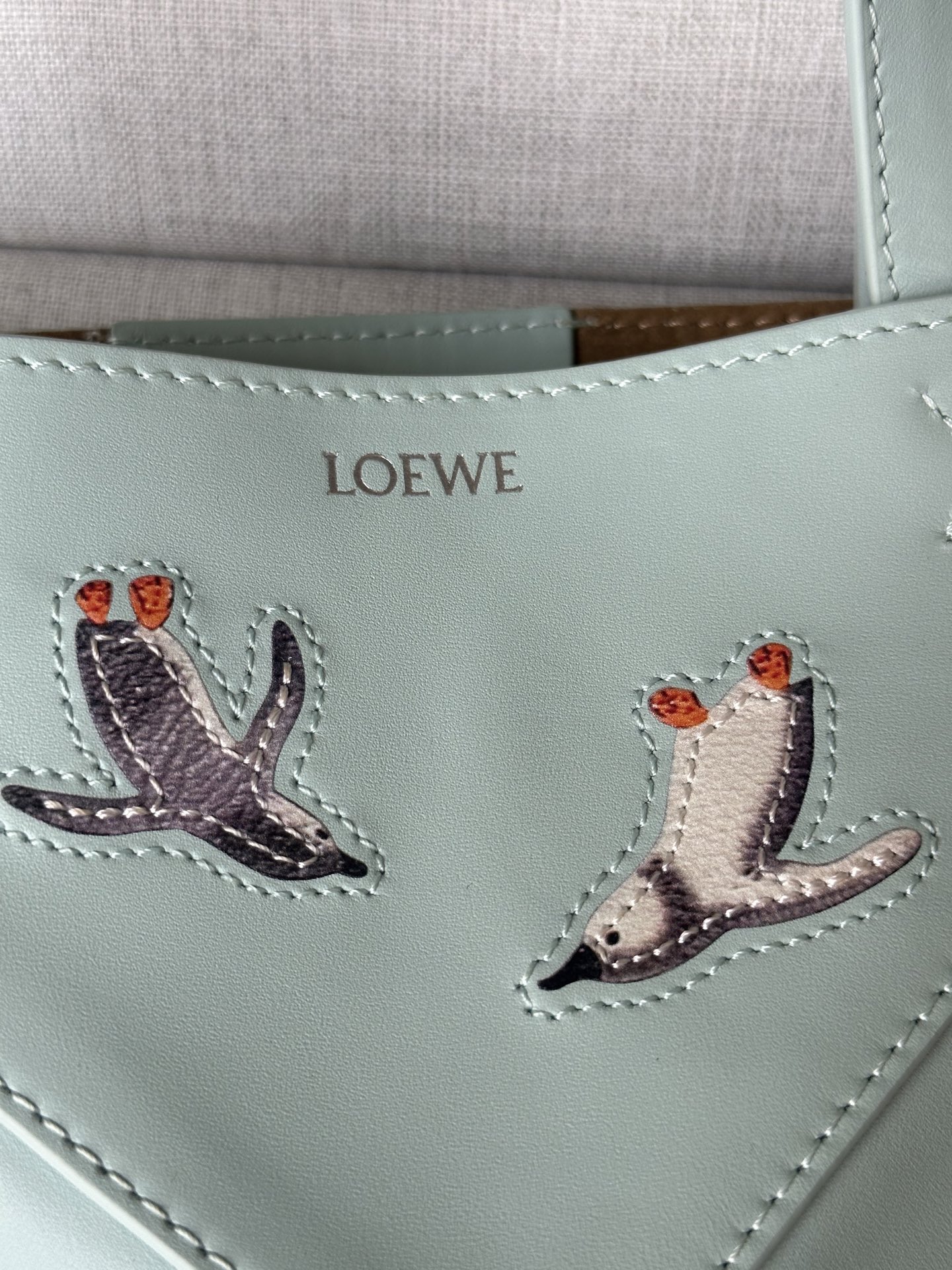 LOEWE Puzzle Fold Mini Tote Bag in Glossy Leather with Penguin Embroidery 10 i1749973919353 4681 0 8
