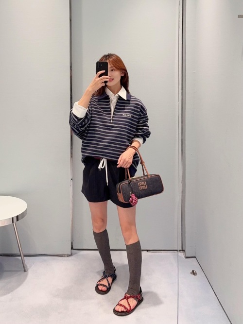 Miu Miu Striped Zip Polo Shirt With Logo, Casual and Stylish for Women 1 Miu Miu Striped Zip Polo Shirt With Logo, Casual and Stylish for Women