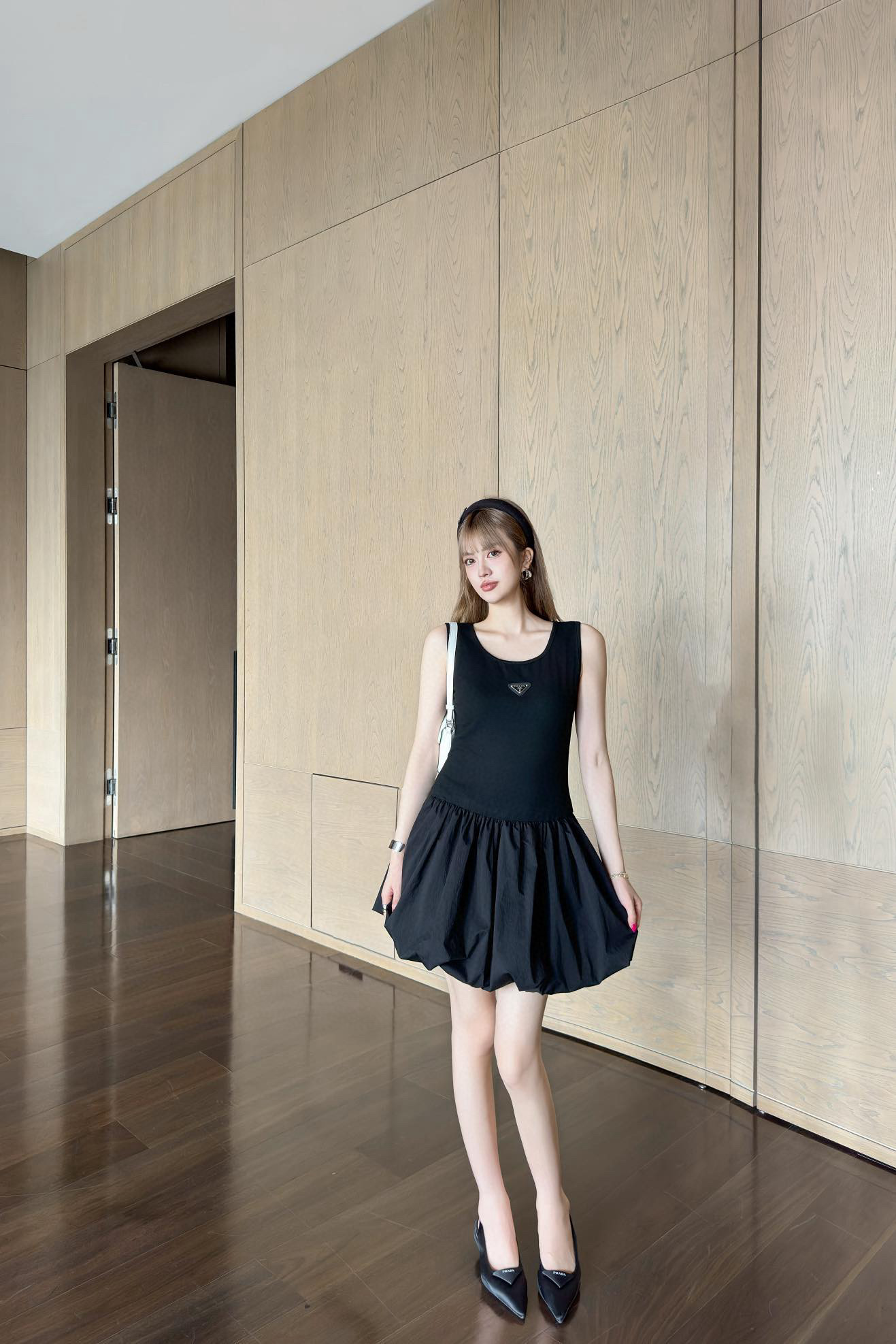 Prada Sleeveless Mini Dress with Triangle Logo and Bubble Hem - Chic & Flirty