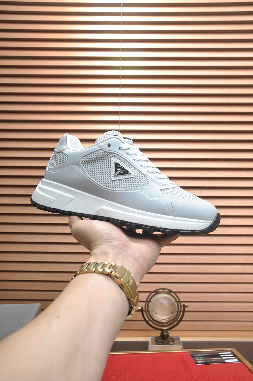 Prada Men's Gray Leather and Mesh Lace-Up Sneakers - Size 38-45 1 Prada Men's Gray Leather and Mesh Lace-Up Sneakers - Size 38-45