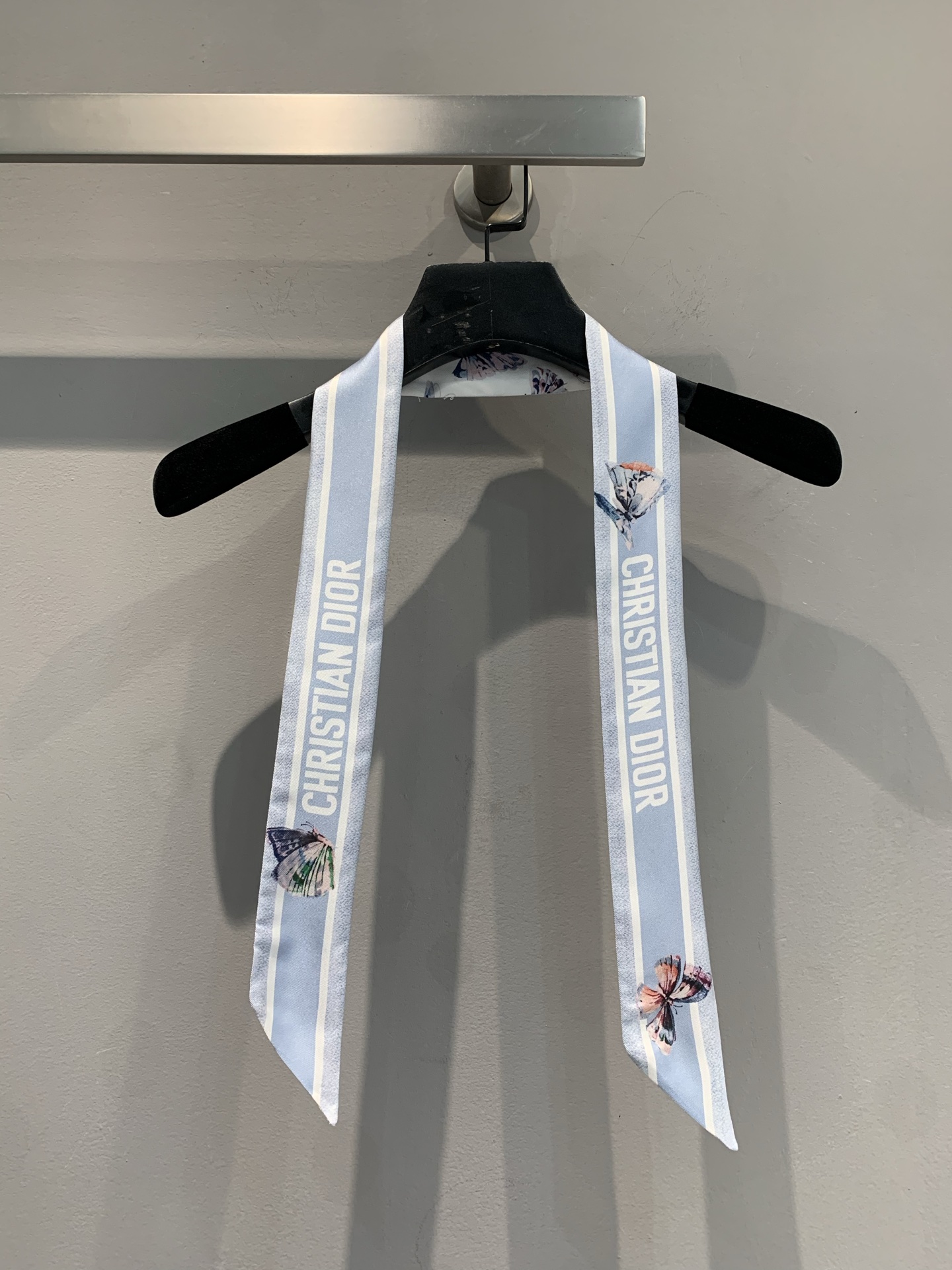 NO:327002,New models are shipped. CD spring and summer new butterfly letter printed silk scarf, light blue background is like the clear sky in spring. The words 