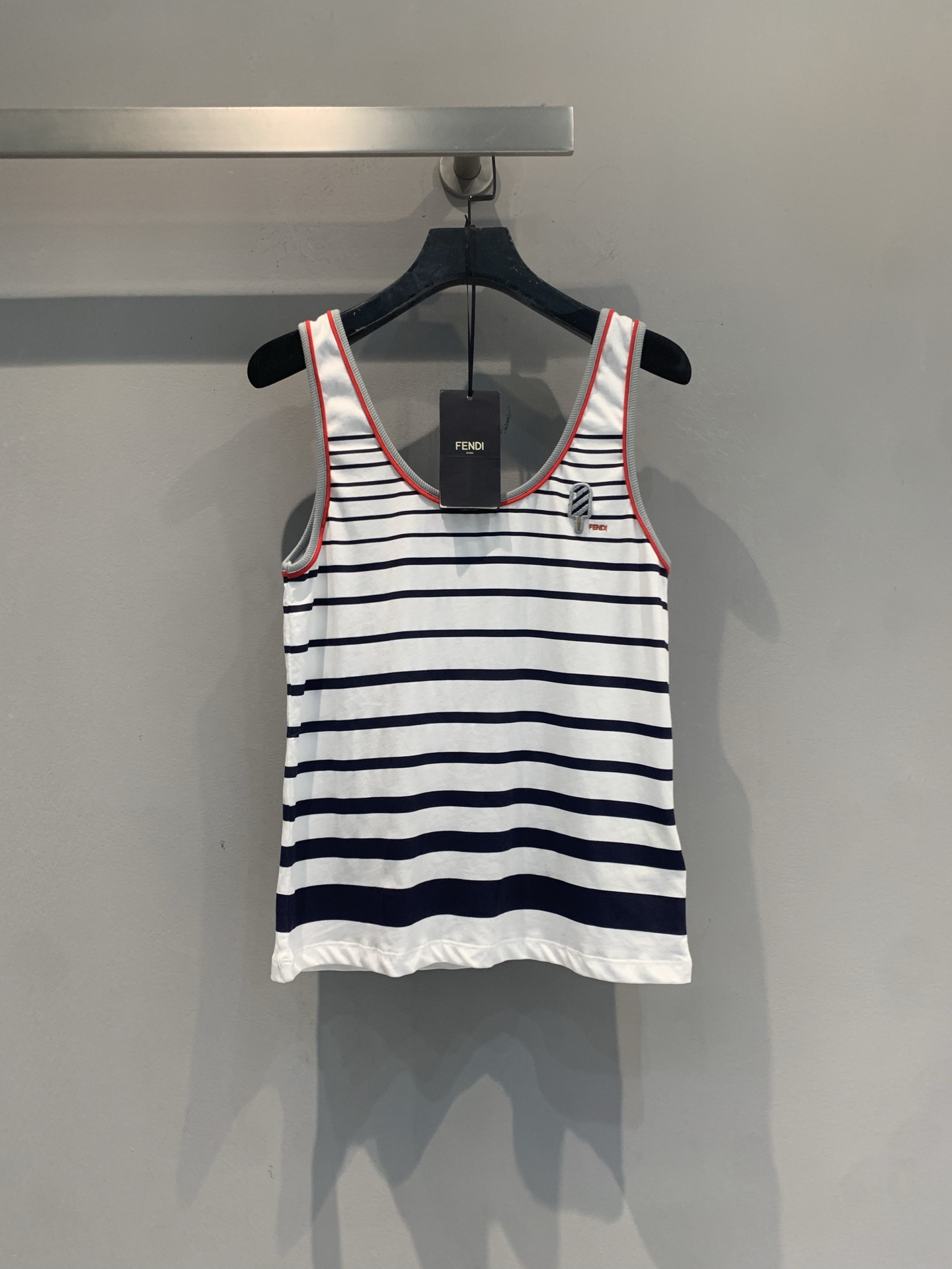 NO:865774,The new model has been shipped. The original developed Fend* spring and summer series striped knitted vest, blue and white navy stripes + red piping, simple and full of vitality!  Soft knitted fabric, breathable and comfortable, perfect for summer wear. FF logo embroidered on the chest for full brand recognition. Sleeveless design, perfect to wear alone or layered with, match with high-waist skirt, shorts, jeans, easy to get a refreshing summer look!  Code numberSML,,fendi,skirts,shorts,jeans,19860909新款出货啦 原版开发 Fend* 春夏系列条纹针织背心,蓝白海军风条纹+红色滚边,简约又活力满满！柔软针织面料,透气舒适,夏天穿超合适.胸前FF标志刺绣,品牌辨识度拉满.无袖设计,单穿或内搭都很OK,搭配高腰裙、短裤、牛仔裤,轻松get清爽夏日look！码数SML,,fendi,skirts,shorts,jeans,,Women's clothing