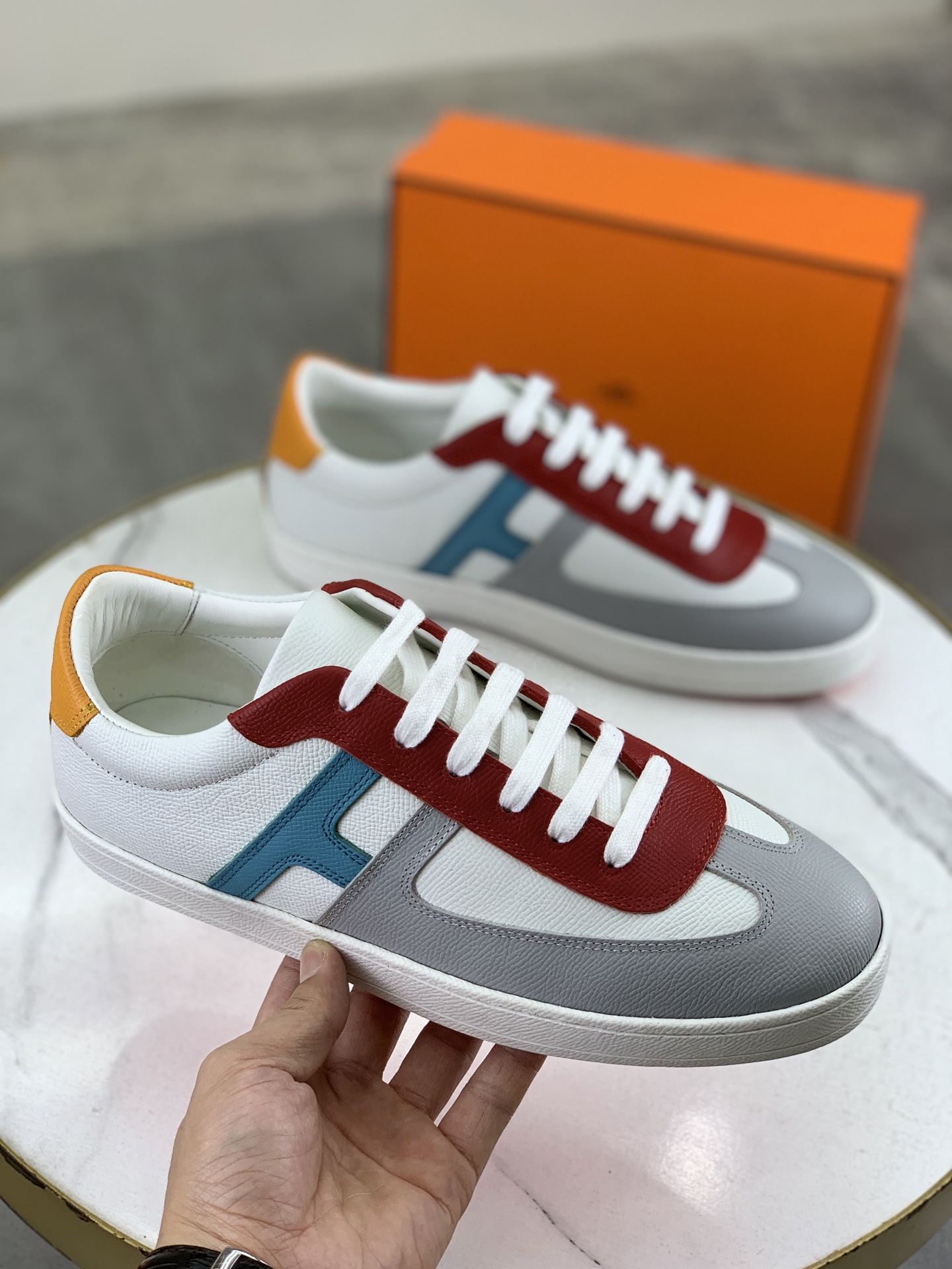 Hermès Men's Leather Sneakers with 'H' Cutout, Luxurious Comfort 4 i1743177165246 3641 0 2