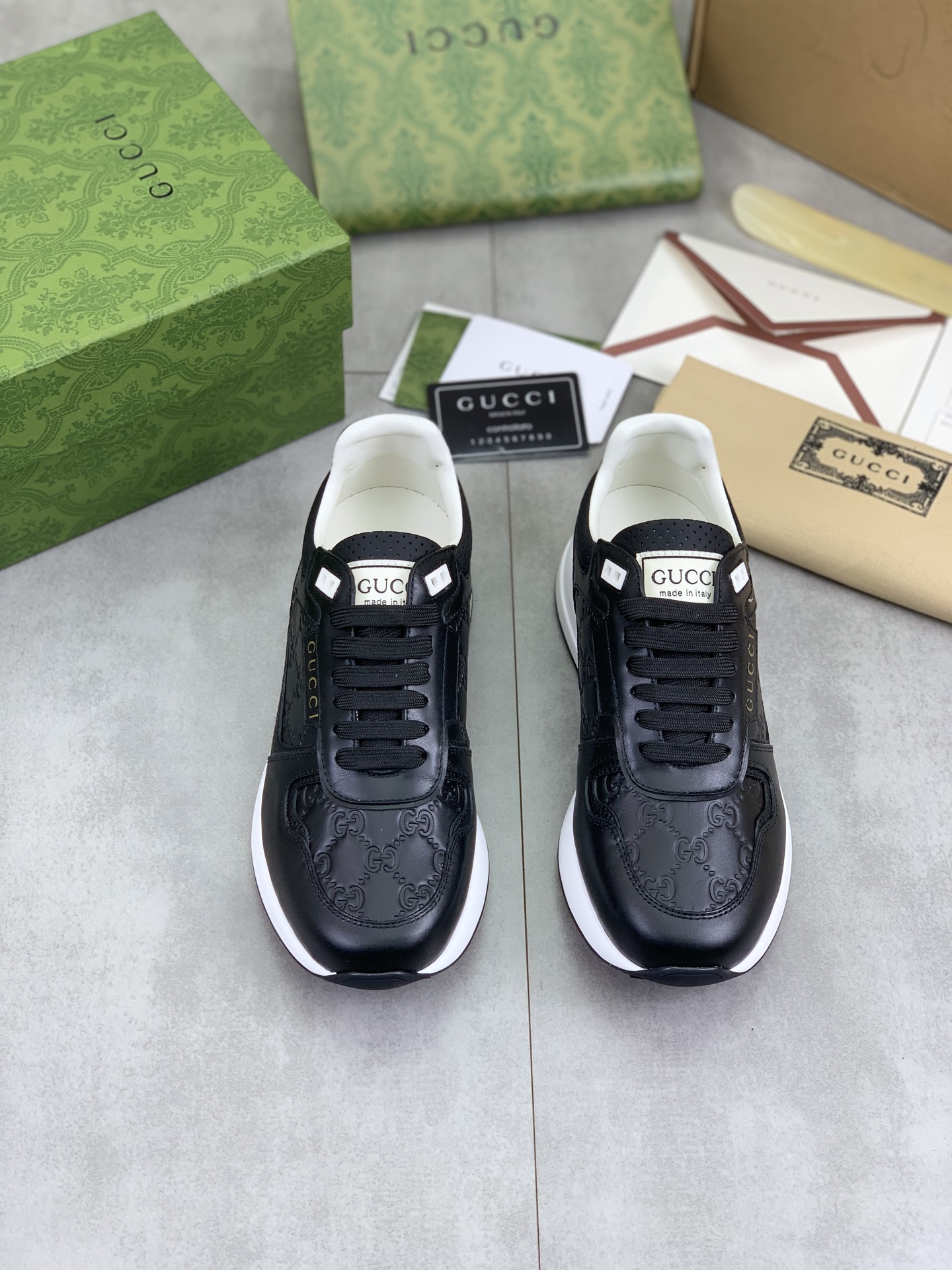 Gucci Men's Black Leather Lace-Up Sneakers with Embossed GG Pattern 3 i1743613678598 2914 0 1