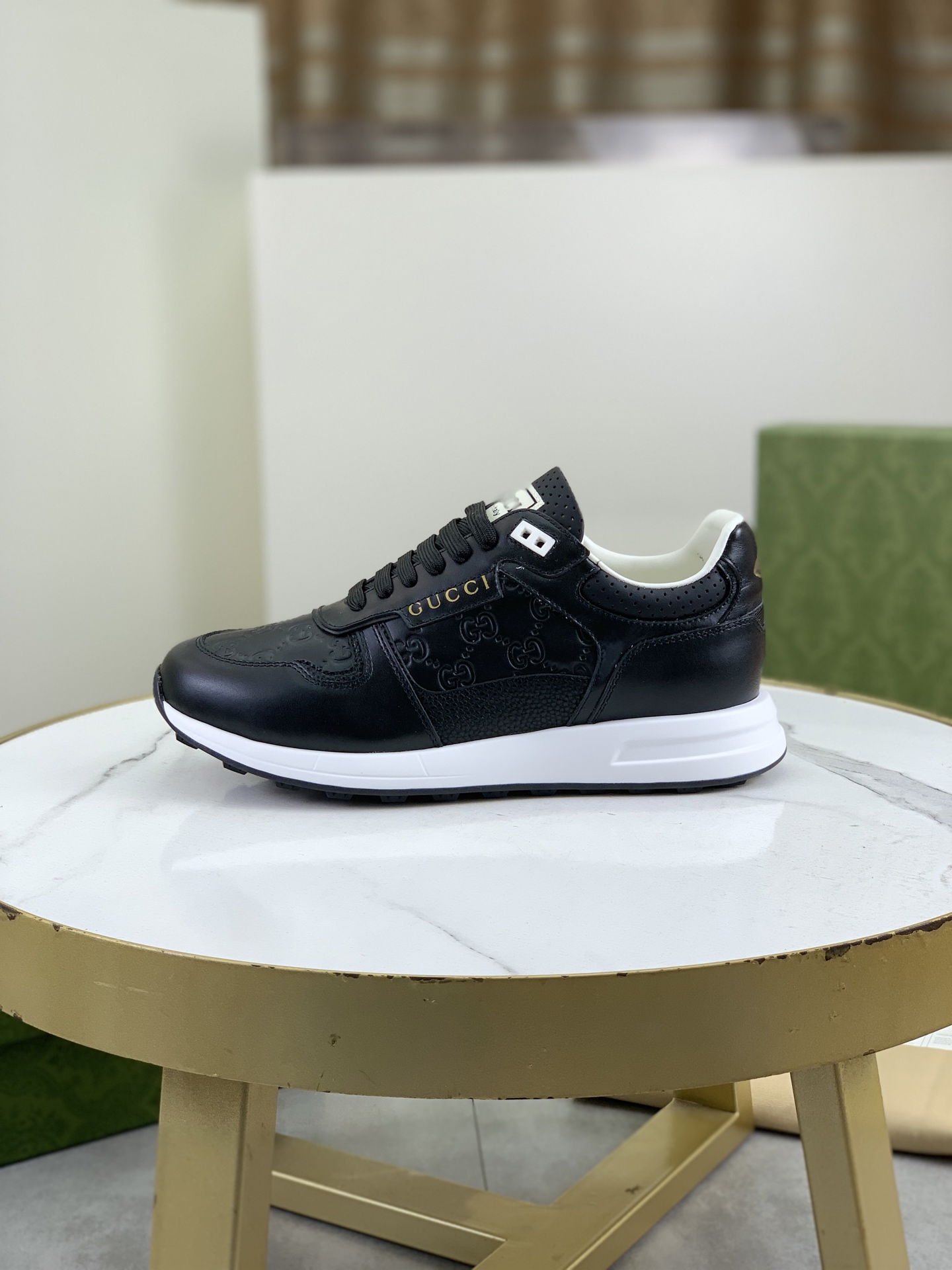 Gucci Men's Black Leather Lace-Up Sneakers with Embossed GG Pattern 1 Gucci Men's Black Leather Lace-Up Sneakers with Embossed GG Pattern