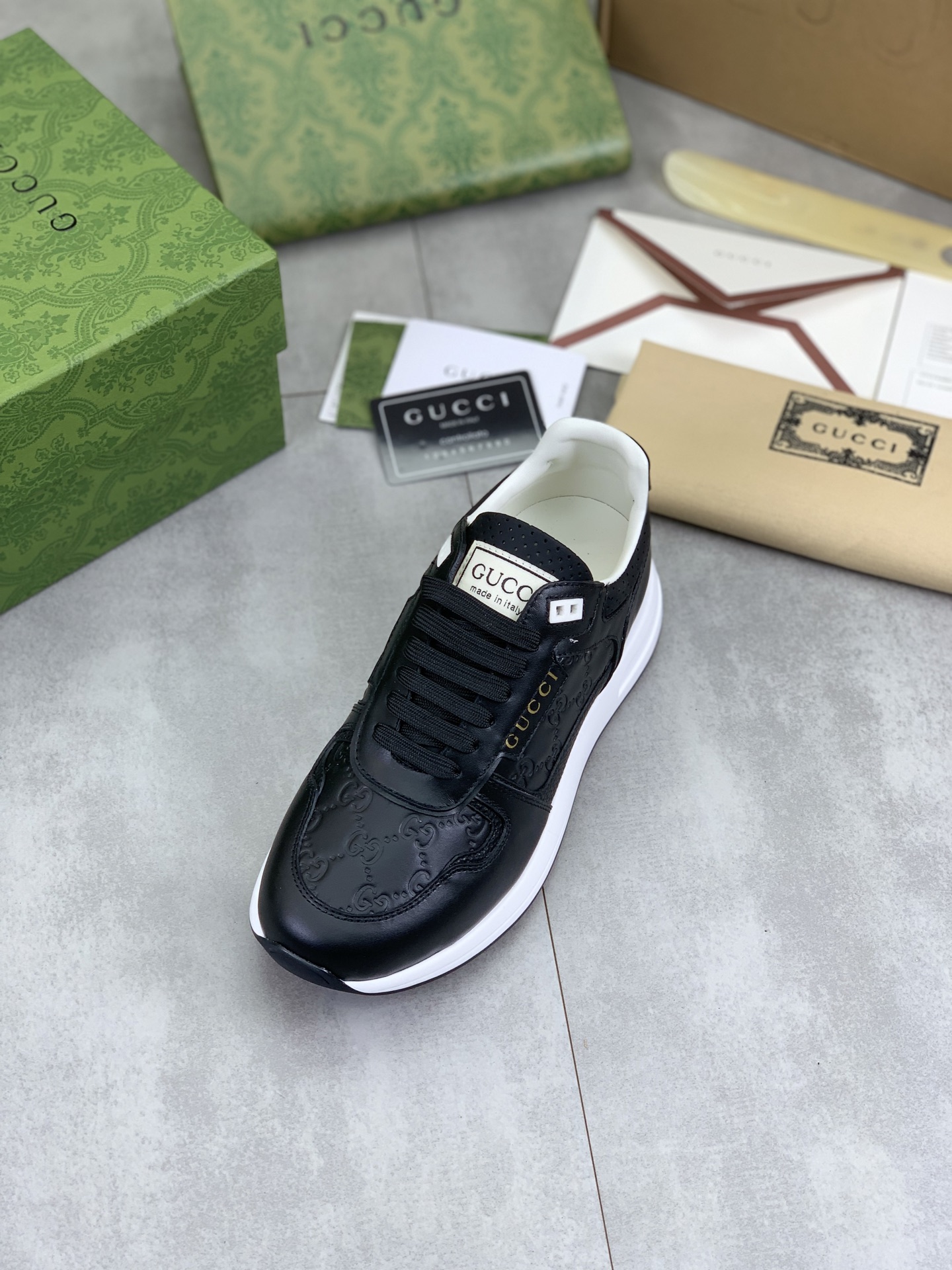 Gucci Men's Black Leather Lace-Up Sneakers with Embossed GG Pattern 5 i1743613681121 960 0 3
