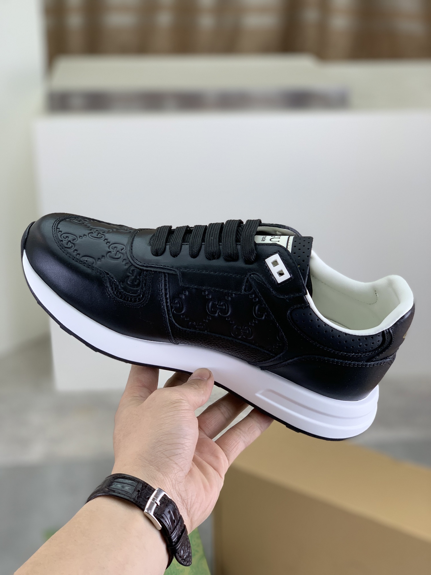Gucci Men's Black Leather Lace-Up Sneakers with Embossed GG Pattern 7 i1743613681214 1255 0 5