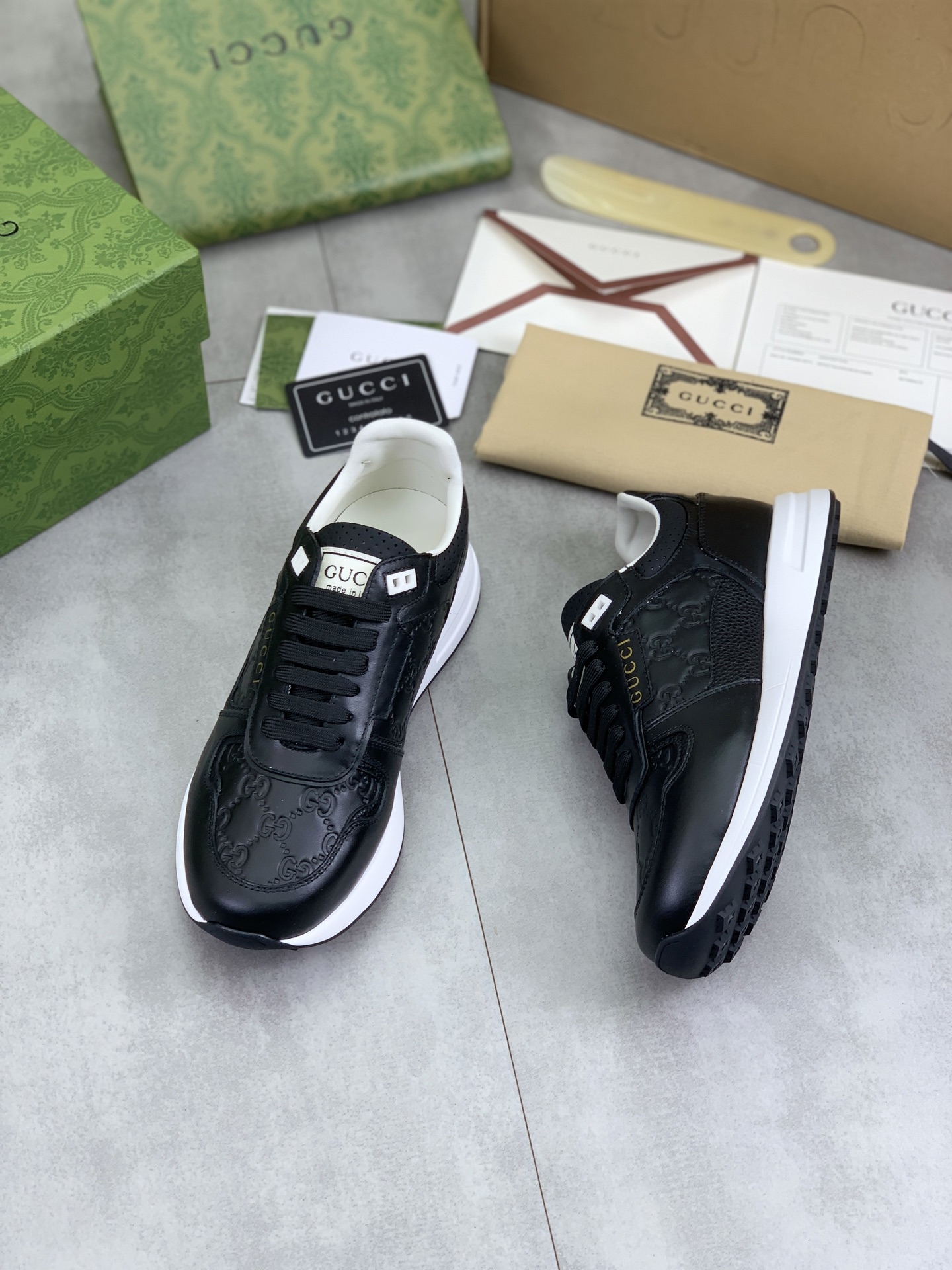 Gucci Men's Black Leather Lace-Up Sneakers with Embossed GG Pattern 6 i1743613681269 198 0 4