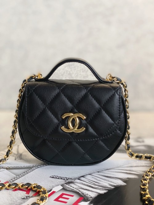 Elegant Black Quilted Leather Crossbody Bag with Chain Strap and Top Handle 1 Elegant Black Quilted Leather Crossbody Bag with Chain Strap and Top Handle