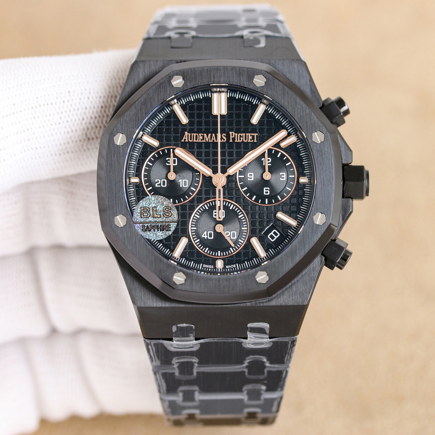 NO:662810,White gold BLS new product Aibi Royal Oak Offshore 26420 series. 1: Dandong factory 4401 guide column movement is 6.8mm thick, all accessories are interchangeable with the original 1-1 replica, 2 Dandong factory 4401 non-caliper balance wheel device movement is more stable and accurate, and all finely engraved characters have the same appearance. 3: Dial logo 1-1 is finely engraved and each character follows the original version, A character with long legs and E character in the middle bevel at the thin horizontal line  4 The enlarged grid of the dial's shading is uniform and three-dimensional, and the wafer checkered embossed lines are obviously consistent with the original version. 5: The dial calendar window is 4-axis laser carved and made three-dimensional and square. 6: The three-dimensional hole lines of the 6-corner holes of the bezel are precise, and the imported high-gloss screws are three-dimensional, clean and bright, and fit perfectly.  7: The sand lines in the dead corner of the case are clearly consistent, the octagonal lines at the bottom of the case ring are three-dimensional and coherent, and the size is accurate. 8: The strap is consistent and smooth from thick to thin, with no big or small edges. The strap is more supple and does not scratch your hands. The light and sand lines are straight and upright, and the screws are neat and three-dimensional. 9: The sand and sand lines on the case ring are consistent and will not break, and the light is brighter.  The sand texture is more delicate, the hole positions and screws are smooth and precise, and all accessories are interchangeable with the original version. The BLS Audemars Piguet 26420 series combines the brand's iconic design, complex functions and top-level craftsmanship. It is suitable for daily wear and can also meet professional timing needs. It can be called a model of modern sports watches. Watch friends are welcome to play, audemars19860909白 金 BLS新品爱比皇家橡树离岸型26420系列. 1:丹东厂4401导柱机芯6.8mm厚度,所有配件与原版1-1复刻可互换, 2丹东厂4401无卡度摆轮装置机芯更稳定更精准,精雕刻字所有外观一致.3:表盘logo1-1精雕雕刻每个字跟足原版,A字带长脚E字中间斜角在细横线 4表盘底纹放大网格均匀立体,威化方格压纹线条明显与原版一致 5:表盘日历窗口4轴激光精雕而成立体方正 6:表圈6角孔位立体孔位线条精准,进口高光螺丝立体整洁光亮,严丝合缝 7:表壳猪嘴死角位砂纹线条明显一致,壳圈底八角线线条立体明显连贯,尺寸精准,8:表带由厚到薄每一粒都连贯流畅不会大小粒或大小边,表带更柔顺不刮手,光位砂位线条笔直立体,螺丝整洁立体亮眼,9:壳圈带拉砂砂纹一致不会断纹不会粗细,光位更亮,砂纹更细腻,孔位与螺丝顺畅精准严丝合缝无偏差,所有配件均可与原版互换,.BLS爱彼26420系列融合了品牌标志性设计、复杂功能与顶级工艺,既适合日常佩戴,亦能满足专业计时需求,堪称现代运动腕表的典范之作.欢迎表友把玩,,audemars,Watch