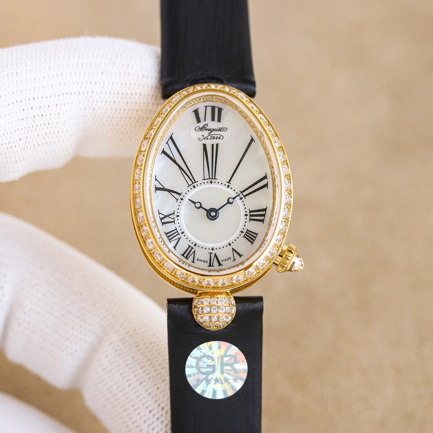 NO:724010,Platinum and crocodile leather GR elegantly produces the most powerful replica women's watch in history - the Breguet Queen of Naples series makes a stunning debut, correcting all the shortcomings of the market version, making it noble and elegant, showing the style of a queen!  [Case] Watch size: small 33 x 25 mm. The oval case is elegant and elegant, with coin patterns on the outer edge of the case. A total of 117 Swarovski crystals (approximately 0.99 carats) are inlaid around the bezel and case. The crown is inlaid with a pear-shaped spar (approximately 0.26 carats) [Excellent details]  1. It is consistent with the original. There are precious metal logos on the back of the case, which is clear and neat, highlighting the quality of the watch. 2. The domed glass not only has a fish-eye effect when viewed from the side, but also reflects the bright light brought by diamonds, which further shows the noble pedigree of the watch.  3. In order to achieve the feel of the original K gold quality, ZF debugged the counterweight of the internal structure of the watch case so that the weight is exactly the same as the original version. [Strap] Silk (lambskin wrapped silk) strap is as gentle as skin, and the Breguet-style folding clasp is elegant and exquisite. [Movement] Customized Breguet .537/3 core, strict QC throughout, precise and stable performance, dignified and beautiful appearance. Dignified and beautiful, noble and elegant, produced by GR.  Must be a quality product~!  ,,breguet,sheepskin,crocodile skin19860909白金 鳄鱼皮 GR优雅出品史上最强复刻女表——宝玑那不勒斯皇后系列惊艳登场,修正市场版本的所有不足,高贵典雅,尽显女王风范！【表壳】腕表尺寸 小号33 x 25毫米 鹅卵形表壳高雅大气,表壳外缘饰有钱币纹.表圈和表壳周围镶嵌共117颗施华洛水晶（约0.99克拉）.表冠处镶有一颗梨形晶石（约0.26克拉）【精彩细节】 1.与原装吻合,在表壳背部均打有贵金属标识,效果清晰工整,彰显腕表档次.2.穹面玻璃,从侧面看不仅有鱼眼效果,还能折射钻石带来的璀璨光芒,更显腕表高贵血统. 3.为了达到原装K金质量的手感,ZF调试了表壳内部结构的配重,做到重量与原版如出一辙.【表带】绢丝（小羊皮包裹丝绸）表带如肌肤般温柔,宝玑式折叠表扣秀雅精巧.【机芯】定制版宝玑.537/3型芯,全程严格QC,性能精准稳定,外观端庄秀丽. 端庄秀丽 高贵典雅 GR出品 必属精品~！,,breguet,sheepskin,crocodile skin,Watch