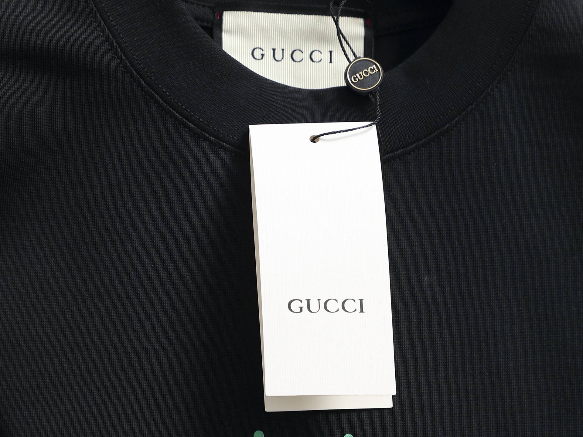 Gucci 高品质Gucci 古驰 以“Original Gucci”格言和品牌独特的绿色和红色为特色的印花短袖