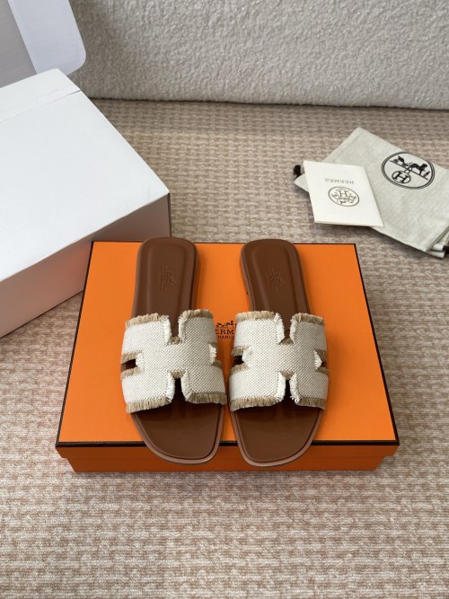Hermes Oran Sandal: Classic Leather H-Strap Slide for Women - Sizes 35-41 1 Hermes Oran Sandal: Classic Leather H-Strap Slide for Women - Sizes 35-41