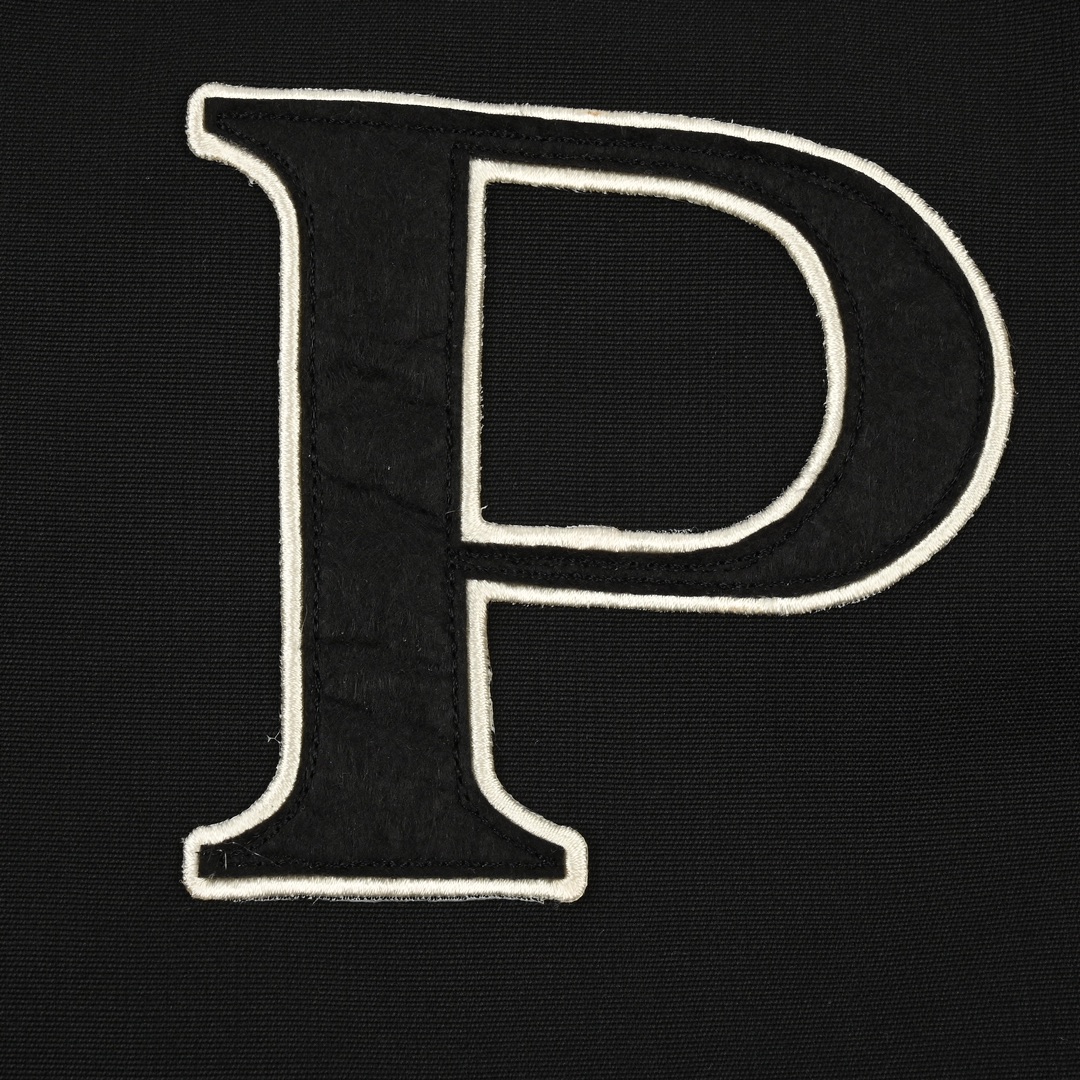 Prada普拉达24FW 帆布粒面夹棉棒球服