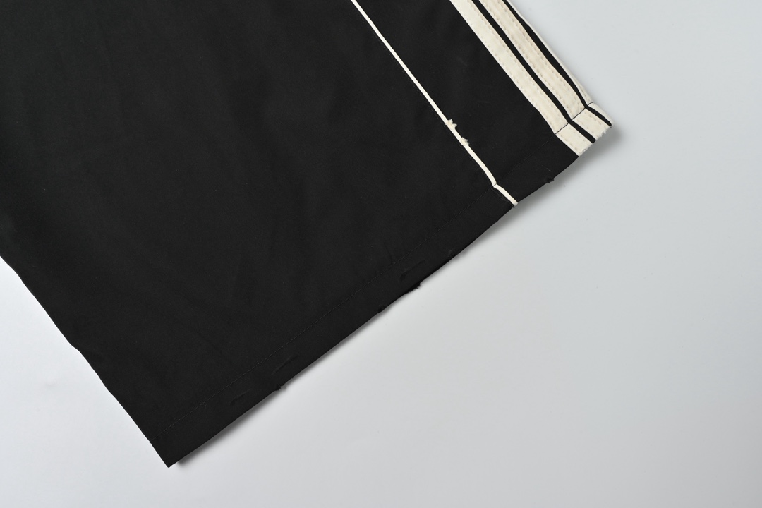 Balenciaga 巴黎世家 圆环刺绣五条杠长裤