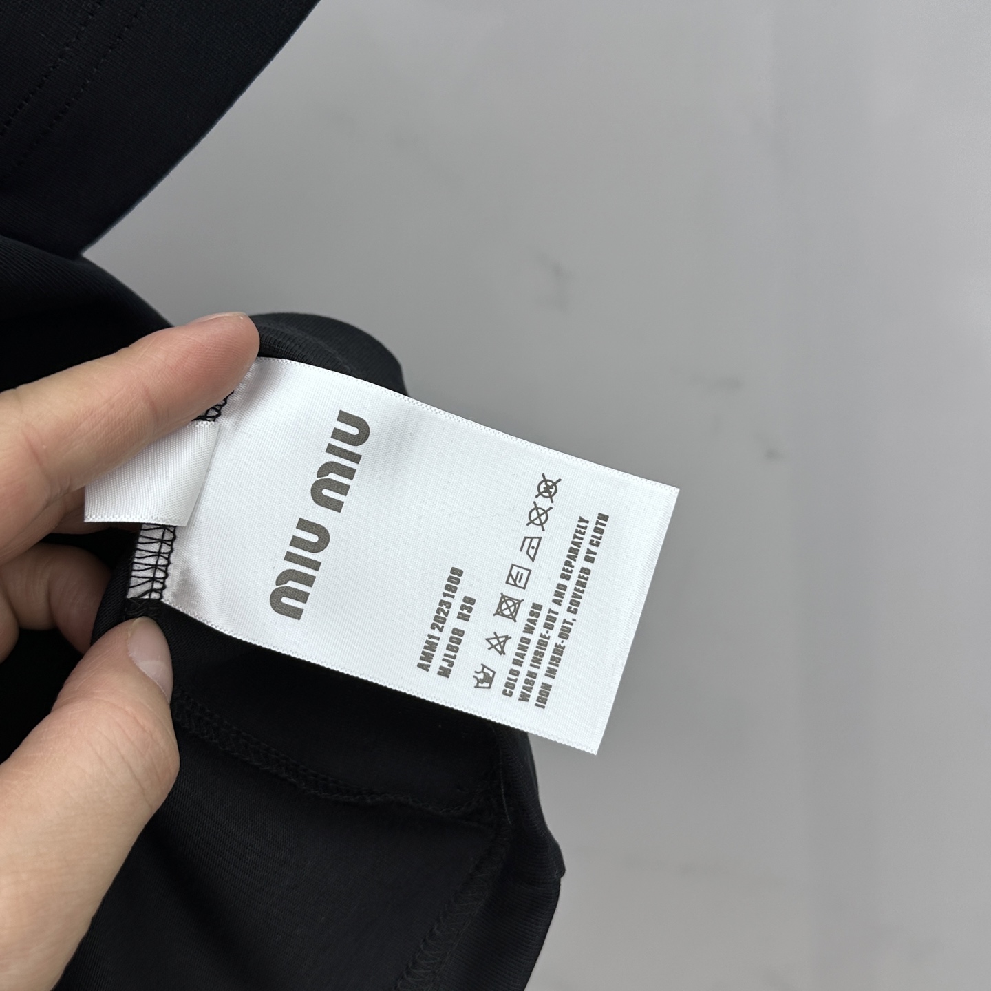 Miu Miu T-Shirt: Spring/Summer Crewneck Tee with Embossed Logo 9 i1744221191514 2195 0 7