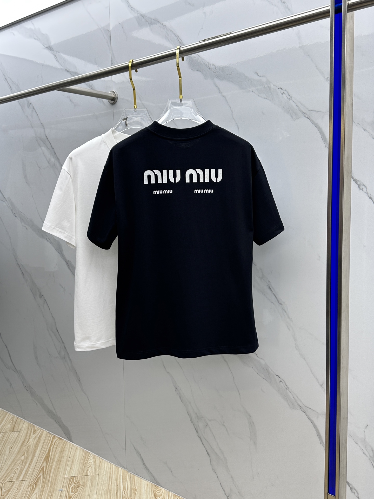 Miu Miu T-Shirt: Spring/Summer Crewneck Tee with Embossed Logo 10 i1744221191574 7247 0 8