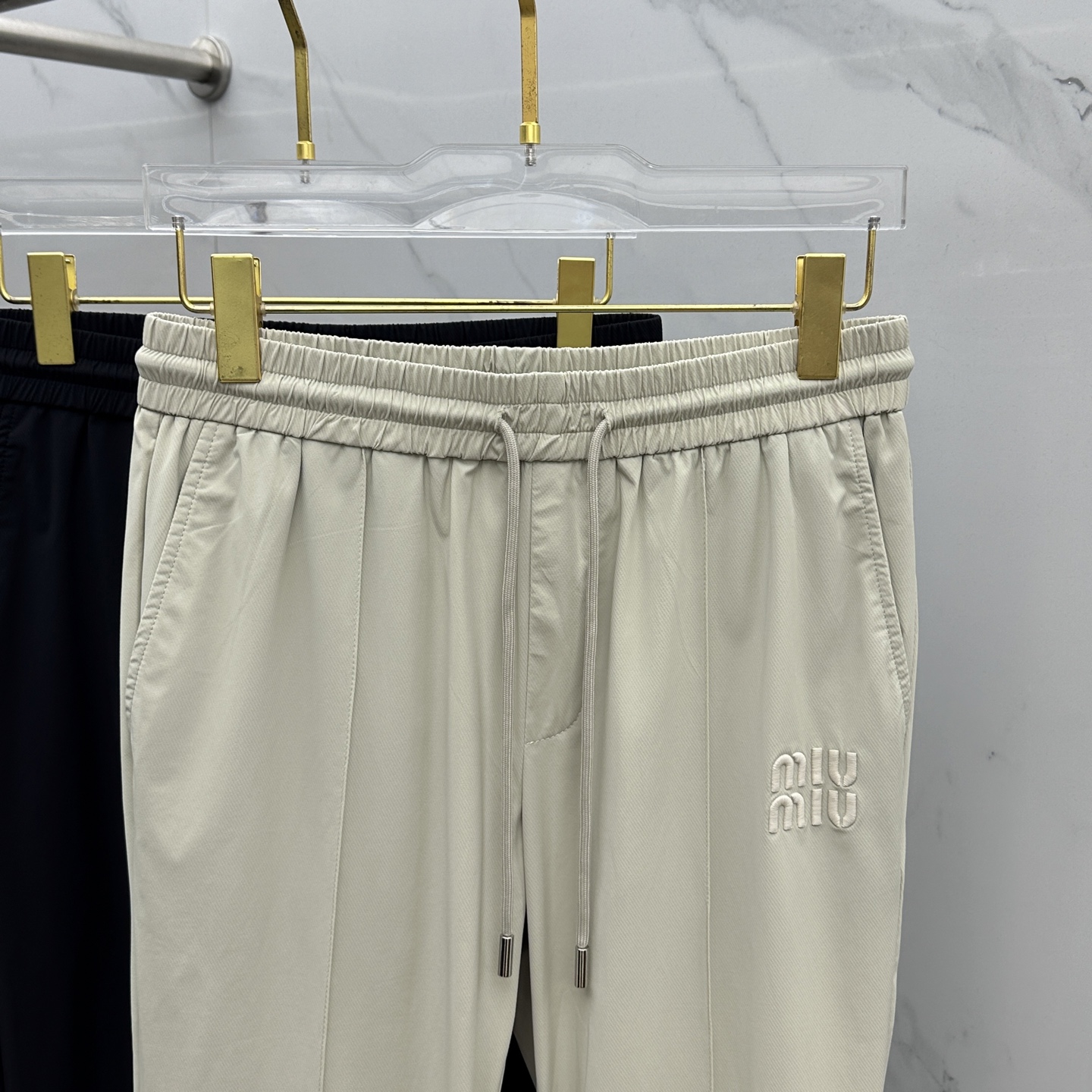 Miu Miu Casual Pants - Embroidered Logo, Premium Fabric, Stylish & Comfortable 4 i1745173090541 4309 0 2