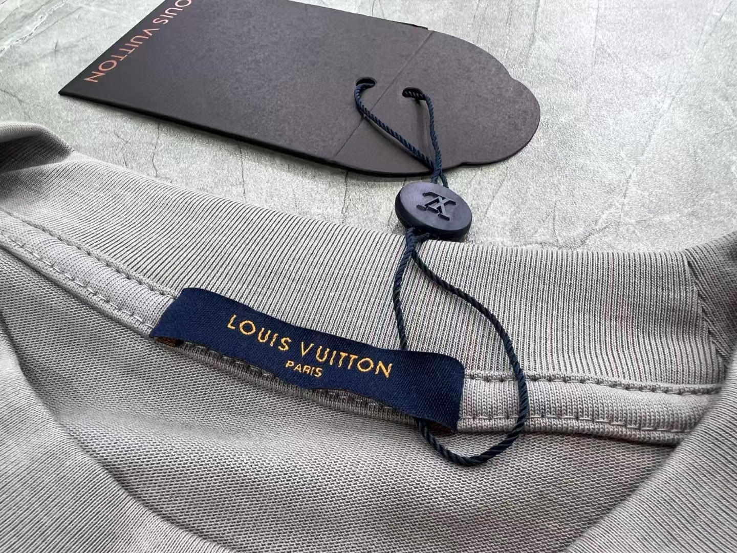Louis Vuitton Gray Crew Neck T-Shirt with Red Logo, Stylish and Comfortable 10 a1745217204640 8514