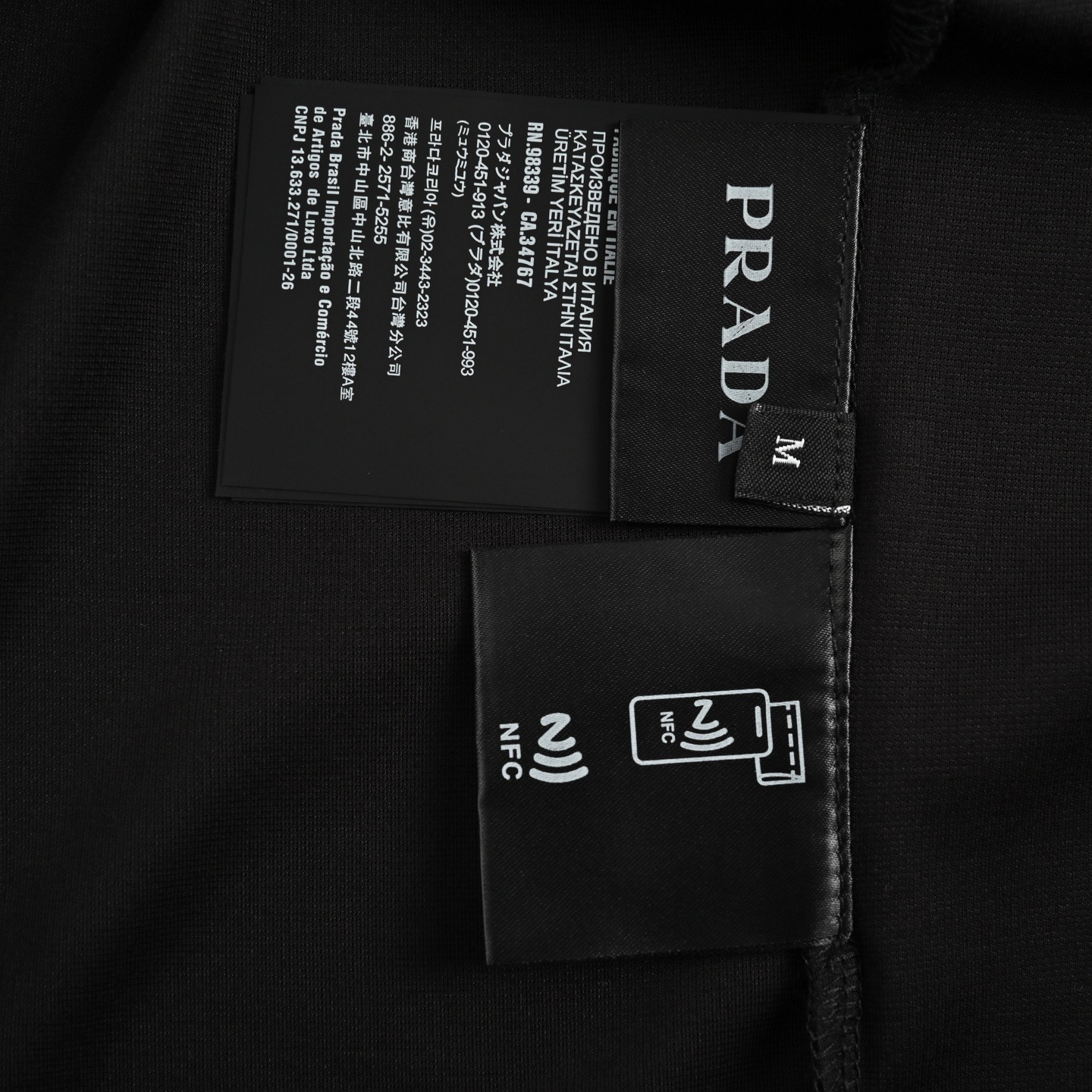 Prada/普拉达 25ss 三角标尼龙口袋拼接Polo短袖