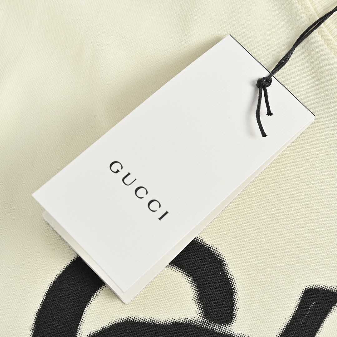 Gucci/古驰 23ss 涂鸦字母印花短袖 春夏新款 字母印花圆领短袖 黑/杏