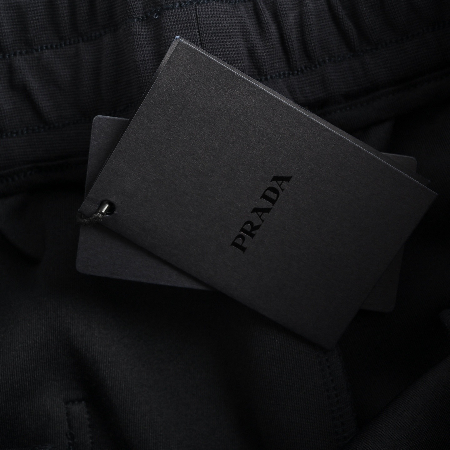 Prada/普拉达 25ss 下摆三角标尼龙拼接口袋短裤