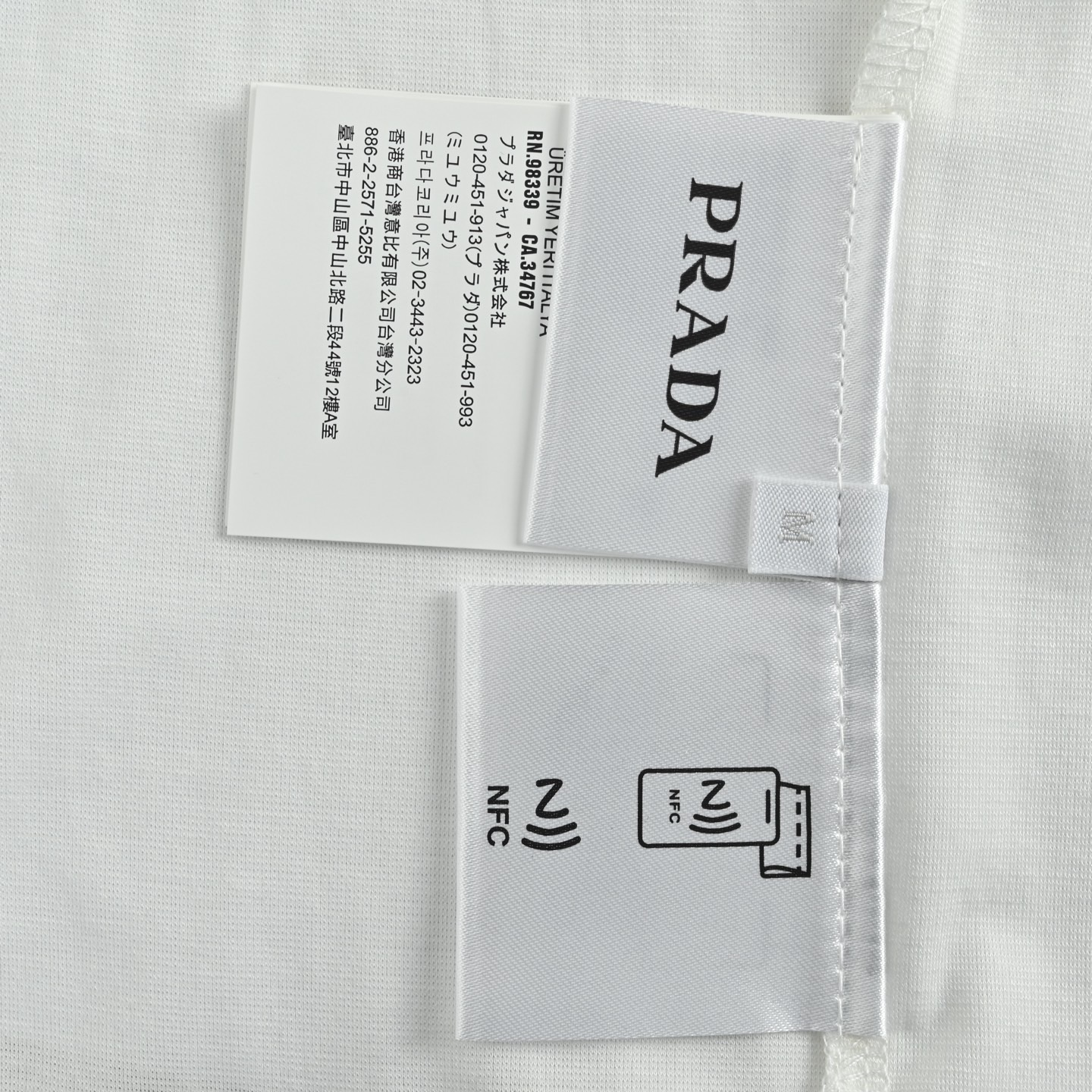 Prada/普拉达 25ss 三角标尼龙口袋拼接Polo短袖
