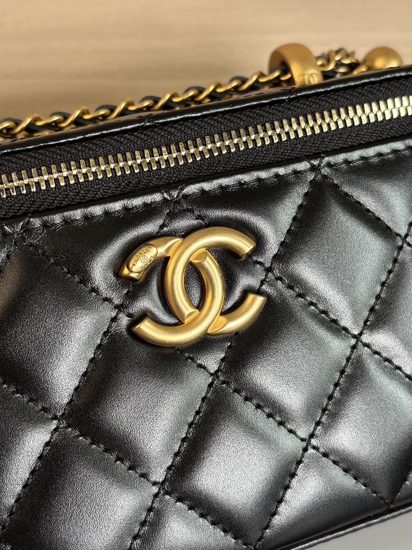Chanel 25 Spring/Summer Black Leather Cosmetic Box with Double Gold Ball 7 i1748156828552 5878 0 5