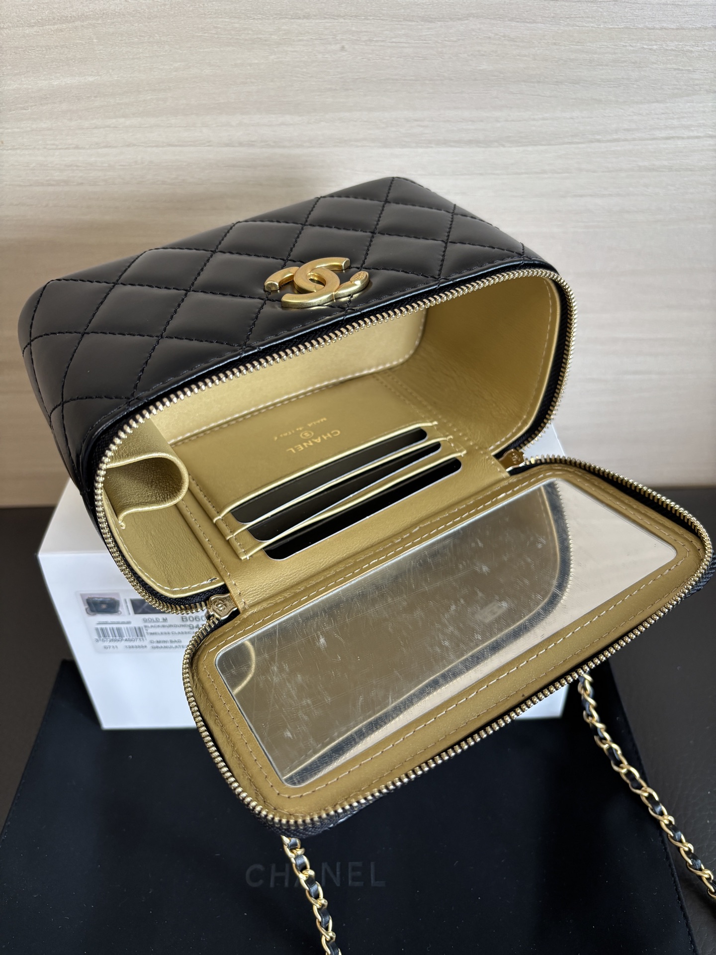 Chanel 25 Spring/Summer Black Leather Cosmetic Box with Double Gold Ball 8 i1748156839497 5660 0 6