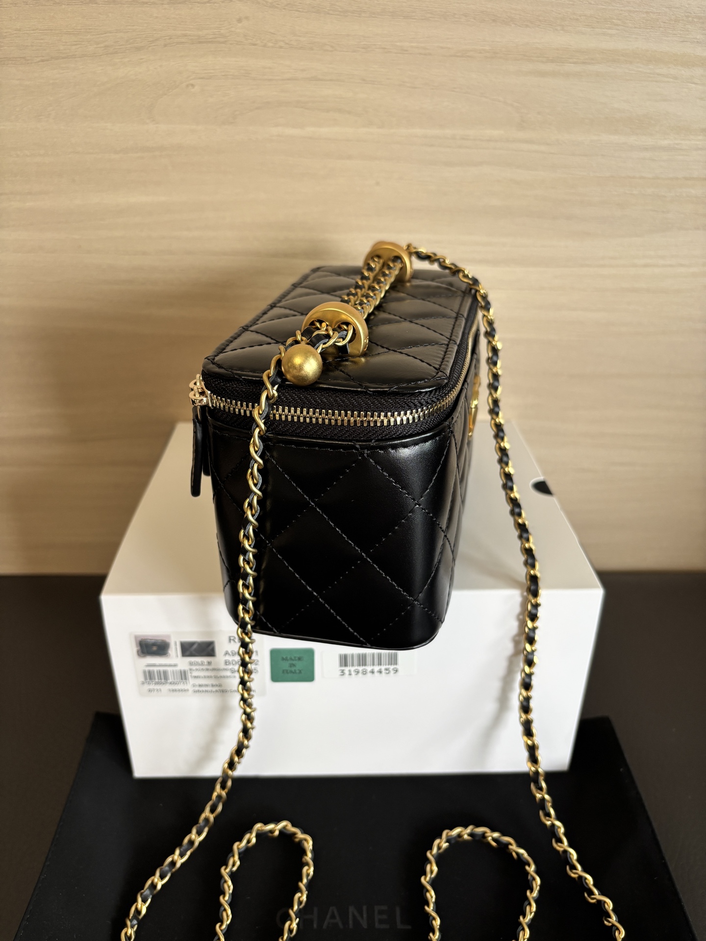 Chanel 25 Spring/Summer Black Leather Cosmetic Box with Double Gold Ball 3 i1748156839546 4143 0 1
