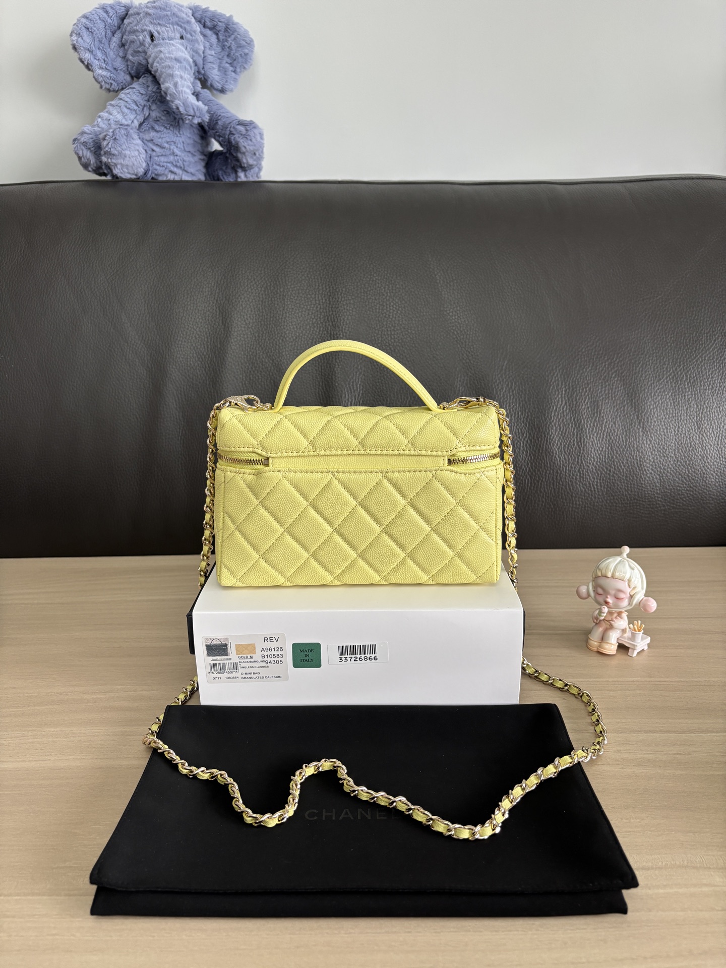 Chanel Quilted Vanity Case Bag with Top Handle and Chain Strap 4 i1749100818072 5575 0 2